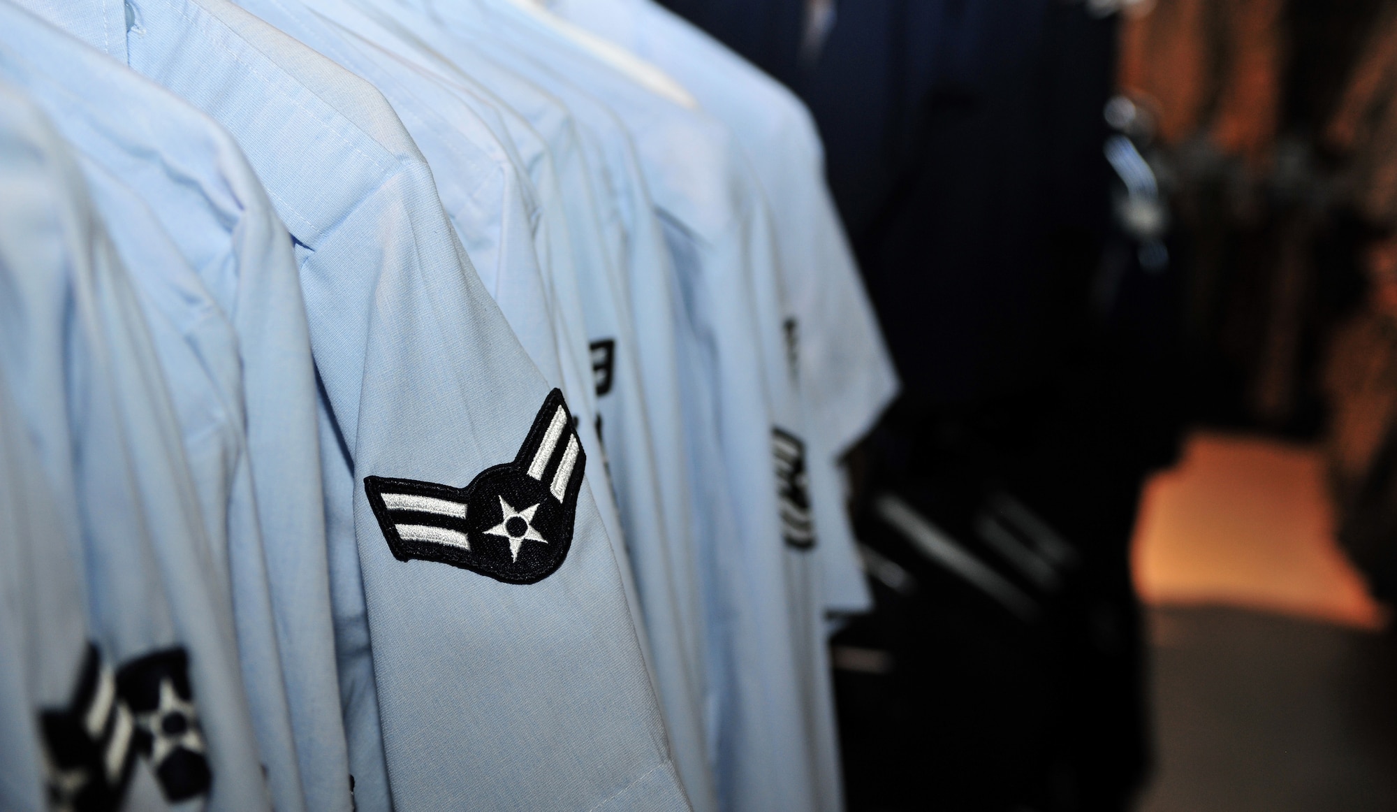 One of the many items available at the Airman’s Attic is a variety of pre-owned uniforms. Many more Items are offered like furniture, dishes, and civilian clothes. (U.S. Air Force Photo by Airman 1st Class Josh Slavin/Released)