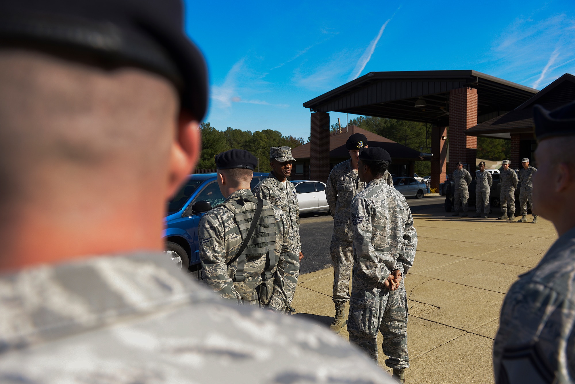 Lt. Gen. Darren McDew, 18th Air Force commander, speaks with Staff Sgt. Mitchell McDonald, a member of 19th Security Forces Squadron here Nov. 6. Several of the top squadron personnel were on hand to explain their duties to McDew during his visit. (U.S. Air Force photo by Staff Sgt. Russ Scalf)
