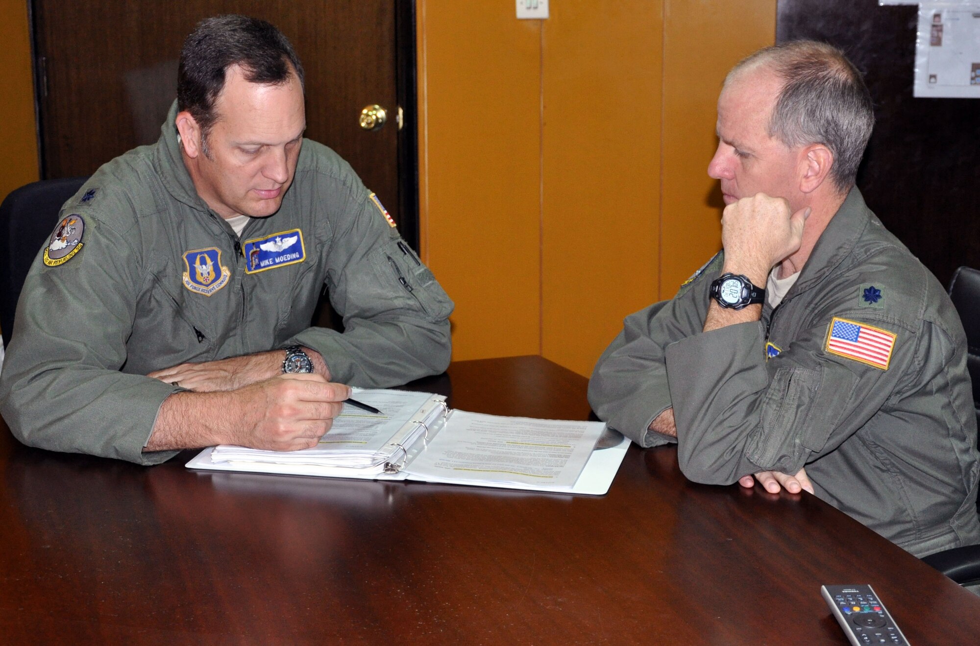 Lt. Col. Michael Moeding, commander of the 90th Expeditionary Air Refueling Squadron, briefs Lt. Col. Eric Vitosh, commander of the 18th Air Refueling Squadron, on the 90 EARS operations at Incirlik Air Base, Turkey, Nov. 8, 2012.  Vitosh will be assuming command of the 90 EARS as part of a changeover of personnel assigned to the squadron.  Both Moeding and Vitosh are members of the Air Force Reserve 931st Air Refueling Group, McConnell Air Force Base, Kan. (U.S. Air Force photo by 1st Lt. Zach Anderson)