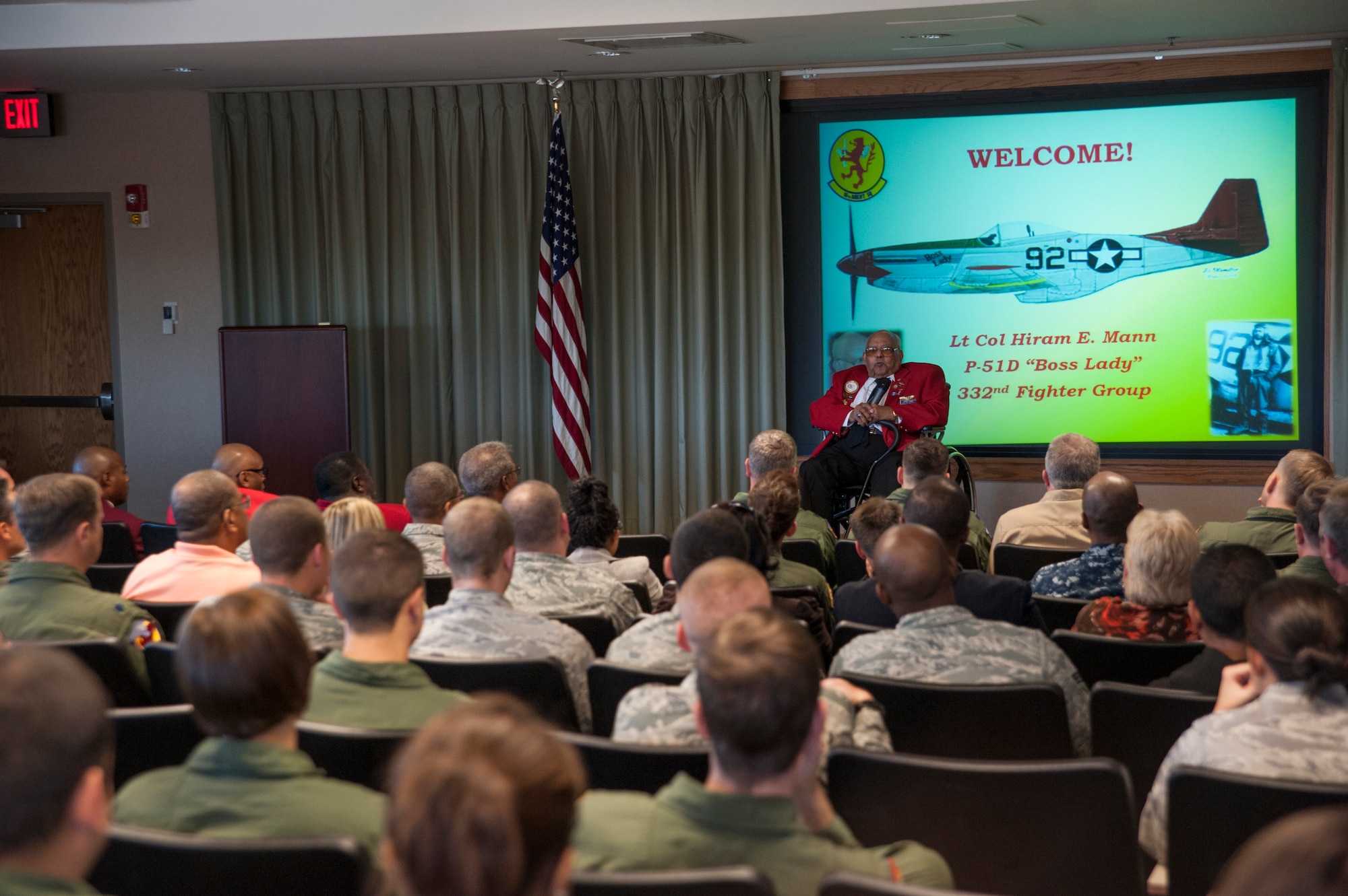 Tuskegee Airman, retired Lt. Col. Hiram Mann, speaks at the 16th Airlift Squadron auditorium, Nov. 2, 2012, at Joint Base Charleston - Air Base, S.C. Entering the Army Air Corps as a pre-aviation student in 1942, Mann was assigned to the 100th Fighter Squadron of the 332nd Fighter Group, the Red Tail Angels, in Italy. During his career, Mann flew the P-40 "Warhawk" and the P-47 "Thunderbolt" fighter-type aircraft, and co-piloted the B-25 "Billy Mitchell" bomber, the C-47 "Gooney-bird" and the C-45 "Expediter” cargo planes. (U.S. Air Force photo/Airman 1st Class Ashlee Galloway)