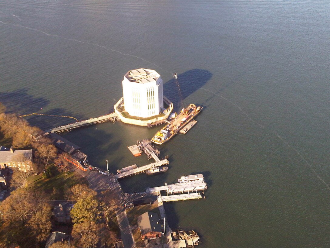 An aerial view of the vent shaft on Governors Island, NY, Nov. 5, shows one of three sites where dewatering operations are taking place on the Brooklyn Battery Tunnel, where 86 million gallons of water are being removed for the state of New York through FEMA by a joint operation by the U.S. Coast Guard, the Metropolitan Transit Authority, the U.S. Army Corps of Engineers and others. As of Nov. 6 pumping operations are complete at 7 of 14 critical locations in NY as determined by local officials.