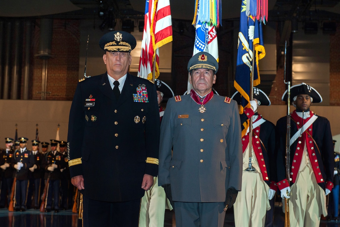 U.S. Army Chief of Staff Gen. Ray Odierno and Chilean Gen. Juan Miguel Fuente-Alba Poblete, commander in chief of Chile's army, stand at attention during an arrival ceremony at Conmy Hall on Joint Base Myer-Henderson Hall, Va., Nov. 6, 2012.