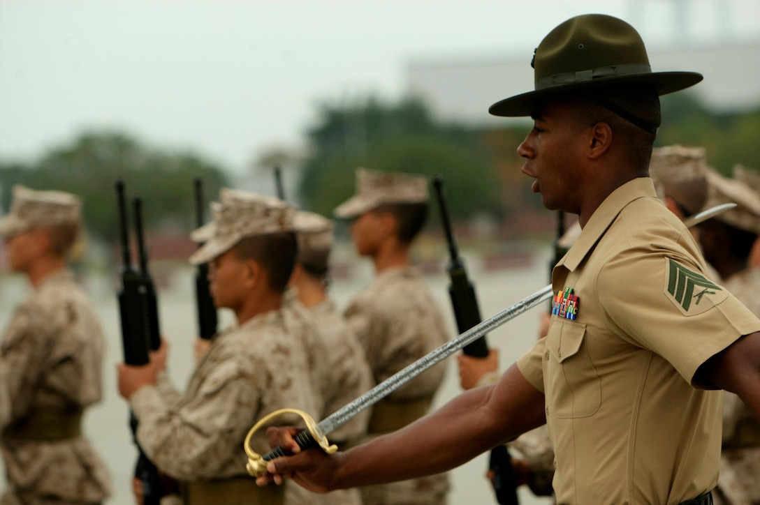 Sgt. Antwan Jones, a drill instructor of Platoon 1093, Bravo Company, 1st Recruit Training Battalion, marches with his platoon during Bravo Company’s initial drill evaluation on Parris Island, S.C., on Oct. 8, 2012. Bravo Company is scheduled to graduate Nov. 30, 2012
