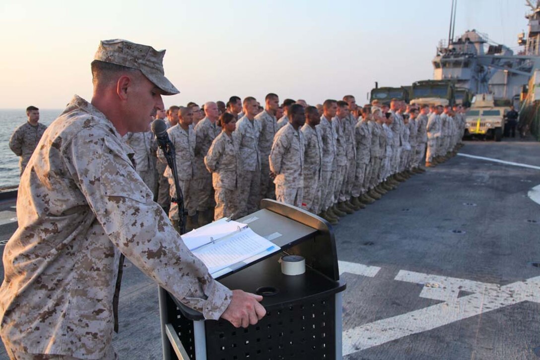 Lieutenant Col. John J. Wiener, commanding officer, Combat Logistics Battalion 15, 15th Marine Expeditionary Unit, gives a speech during an early Marine Corps Birthday celebration on the flight deck of the USS Rushmore, Nov. 7. The 15th MEU is deployed as part of the Peleliu Amphibious Ready Group as a theater reserve and crisis response force throughout U.S. Central Command and the U.S. 5th Fleet area of responsibility.