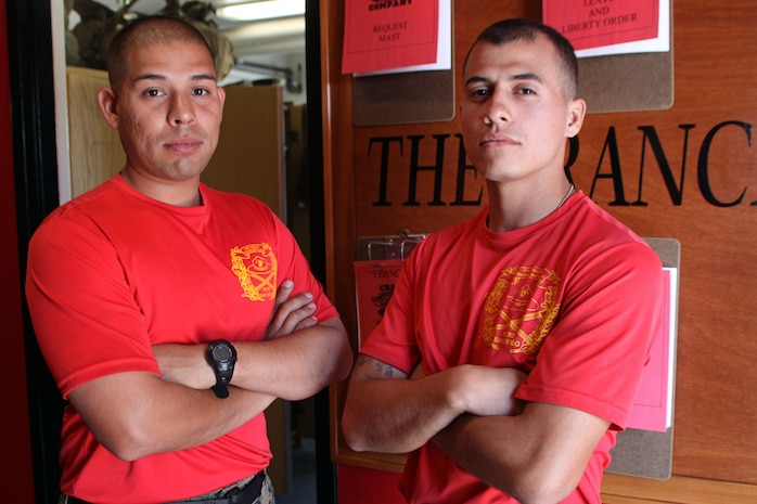 Sgt. Juan E. Duque, senior drill instructor, Platoon 1041, Company C, left, stands with Staff Sgt. Michael A. Garcia, chief drill instructor, Co. C., right, aboard Marine Corps Recruit Depot San Diego, Nov. 2. Duque has had three honor platoons during his drill instructing career. 