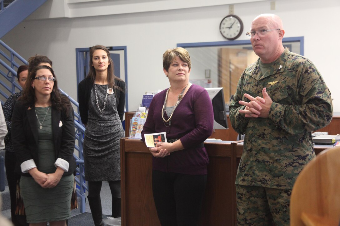 Col. Brian Murtha, Marine Corps Air Station Beaufort commanding officer, speaks to guests before the ribbon cutting ceremony for the First Lady of the Marine Corps Recommended Reading List section at the Air Station Library, Nov. 8.