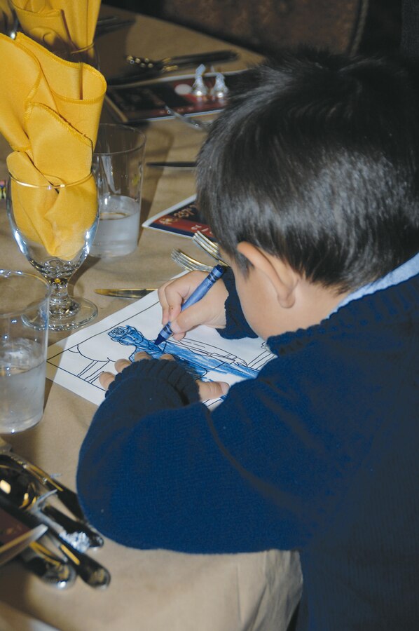 About 150 people, 72 of them children ages   2 - 14, attend the first-time Kids' Marine Corps Birthday Ball at Marine Corps Logistics Base Albany, Nov. 3.