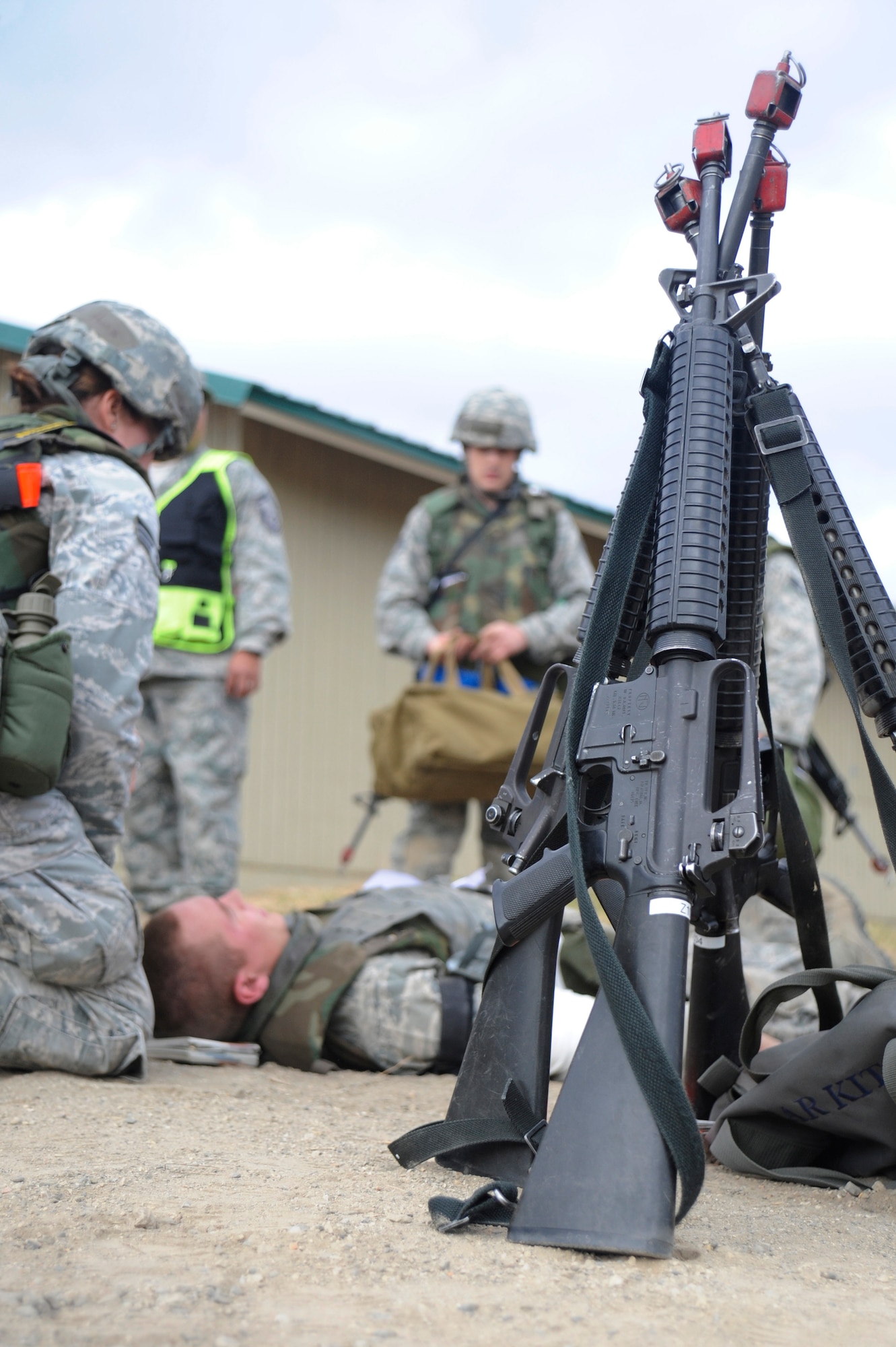VANDENBERG AIR FORCE BASE, Calif. --
Vandenberg Airmen help identify and stabilize the wounded after a simulated attack during a Northstar exercise here Thursday, Nov. 8, 2012. The Northstar exercise is designed to test the deployment capabilities and combat survival skills of Vandenberg Airmen. (U.S. Air Force photo/Michael Peterson)