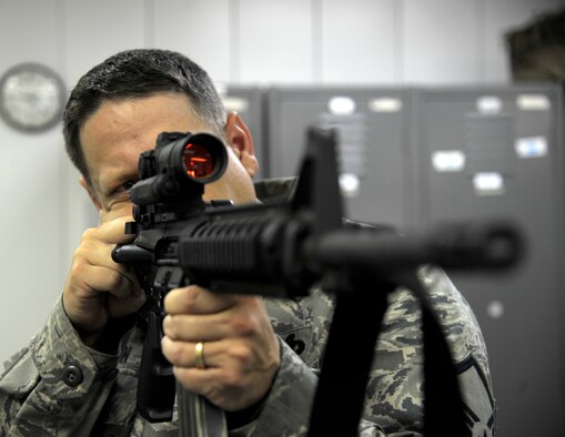 During the in-class portion students are taught how to line up their sights with the targets. With the CATM range reopened, the Combat Arms team will begin instructing Airmen on new Air Force weapons training and certification requirements. (U.S. Air Force photo/Senior Airman Cody H. Ramirez) (Released)