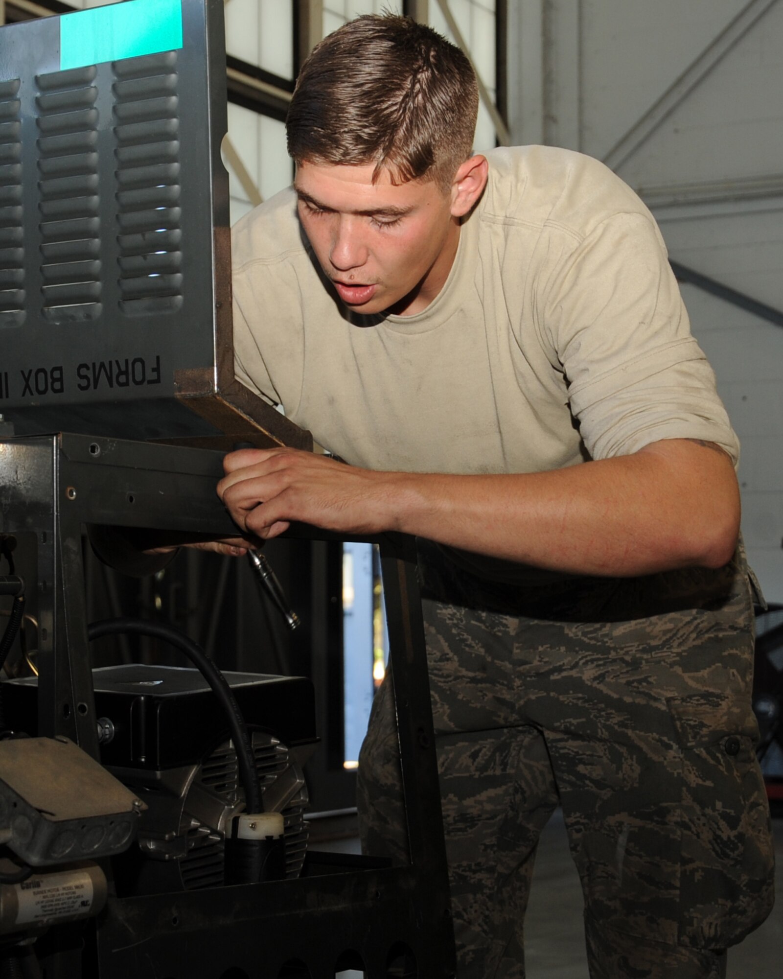 Senior Airman Ricky Shelton, 2nd Maintenance Squadron aerospace ground equipment technician repairs a new generation heater on Barksdale Air Force Base, La., Nov. 9. The AGE flight maintains equipment and tools required to keep aircraft mission operational. The Air Force is committed to ensuring the nation's continued ability to hold any target at risk through its unique ability to employ airpower globally.(U.S. Air Force photo/Senior Airman Sean Martin)(RELEASED)