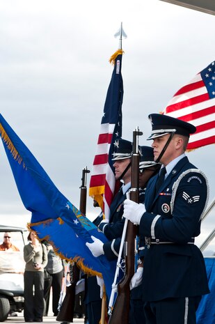 Members of the Nellis Air Force Base Honor Guard post the colors during a naturalization ceremony Nov. 09, 2012, at Nellis Air Force Base, Nev. The guest speaker for the ceremony was Col. Robert Garland, U.S. Air Force Weapons School commandant. (U.S. Air Force photo by Airman 1st Class Jason Couillard)