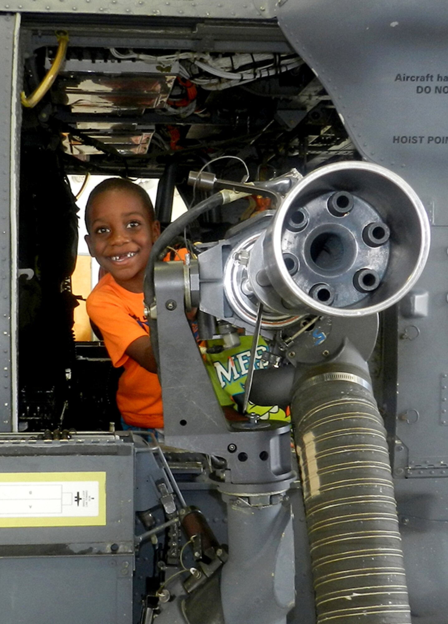 A young patriot climbs aboard an HH-60G Pave Hawk helicopter during a 920th Rescue Wing Open House at Patrick Air Force Base, Fla.June 2. Throughout the day, approximately 700 family members and civilian employers of 920th RQW Air Force Reservists enjoyed combat-search-and-rescue aircraft and equipment displays, in addition to an appreciation picnic. For Air Force Reservists to successfullly serve the nation, it takes the support and flexibility of not only their families, but their civilian employer. (U.S. Air Force photo/Capt. Cathleen Snow)