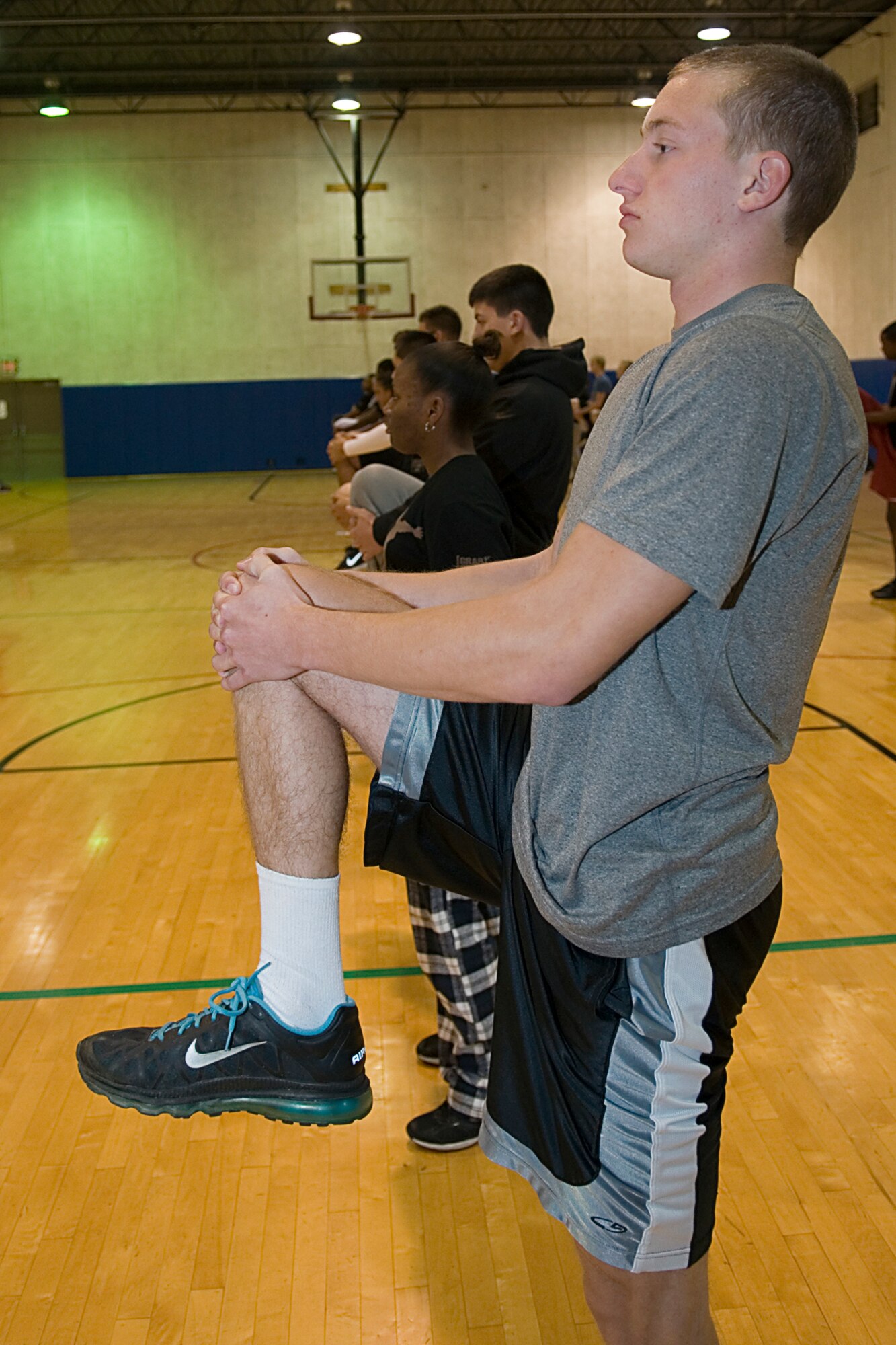 GRISSOM AIR RESERVE BASE, Ind. ? Dillon Easley-Frederickson, 434th Development and Training Flight trainee, stretches before a run during the November unit training assembly. The purpose of the 434th D&TF is to prepare new enlisted Airmen for basic training and to help with long-term retention. (U.S. Air Force photo/Staff Sgt. Ben Mota)