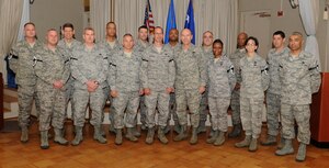 The newly chief master sergeant selects stand with U.S. Air Force Lt. Gen. William J. Rew, vice commander of Air Combat Command, during a promotion-release ceremony at Langley Air Force Base, Va., Nov. 8, 2012. Chief master sergeants must exemplify the finest qualities of an Airman, while striving to further develop their leadership and management skills. (U.S. Air Force photo by Senior Airman Racheal E. Watson/Released)