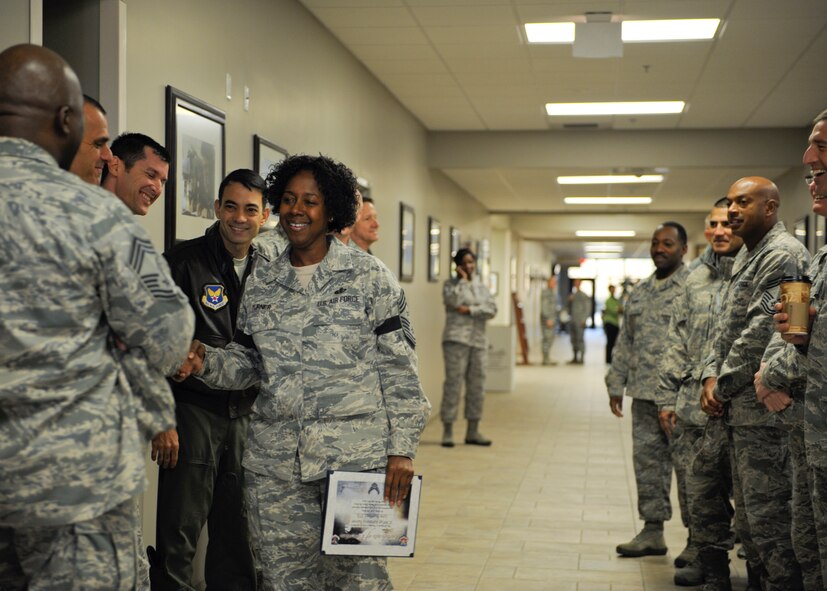 U.S. Air Force Senior Master Sgt. Kimberly Turner, 23d Force Support Squadron, shakes the hands of commanders and chief master sergeants who came to congratulate her on the promotion to chief master sergeant at Moody Air Force Base, Ga., Nov. 8, 2012. Attaining the rank of chief master sergeant is extremely competitive, and factors for promotion potential are assessed and have the final approval by the Chief of Staff of the Air Force. (U.S. Air Force photo by Senior Airman Eileen Meier/Released)