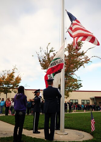 Members of the Beale Air Force BaseHonor Guard, raise Old Glory during a flag ceremony in observance of Veteran's Day at Bear River Middle School, Calif.,  Nov. 9, 2012. (U.S. Air Force photo by Senior Airman Shawn Nickel/Released)