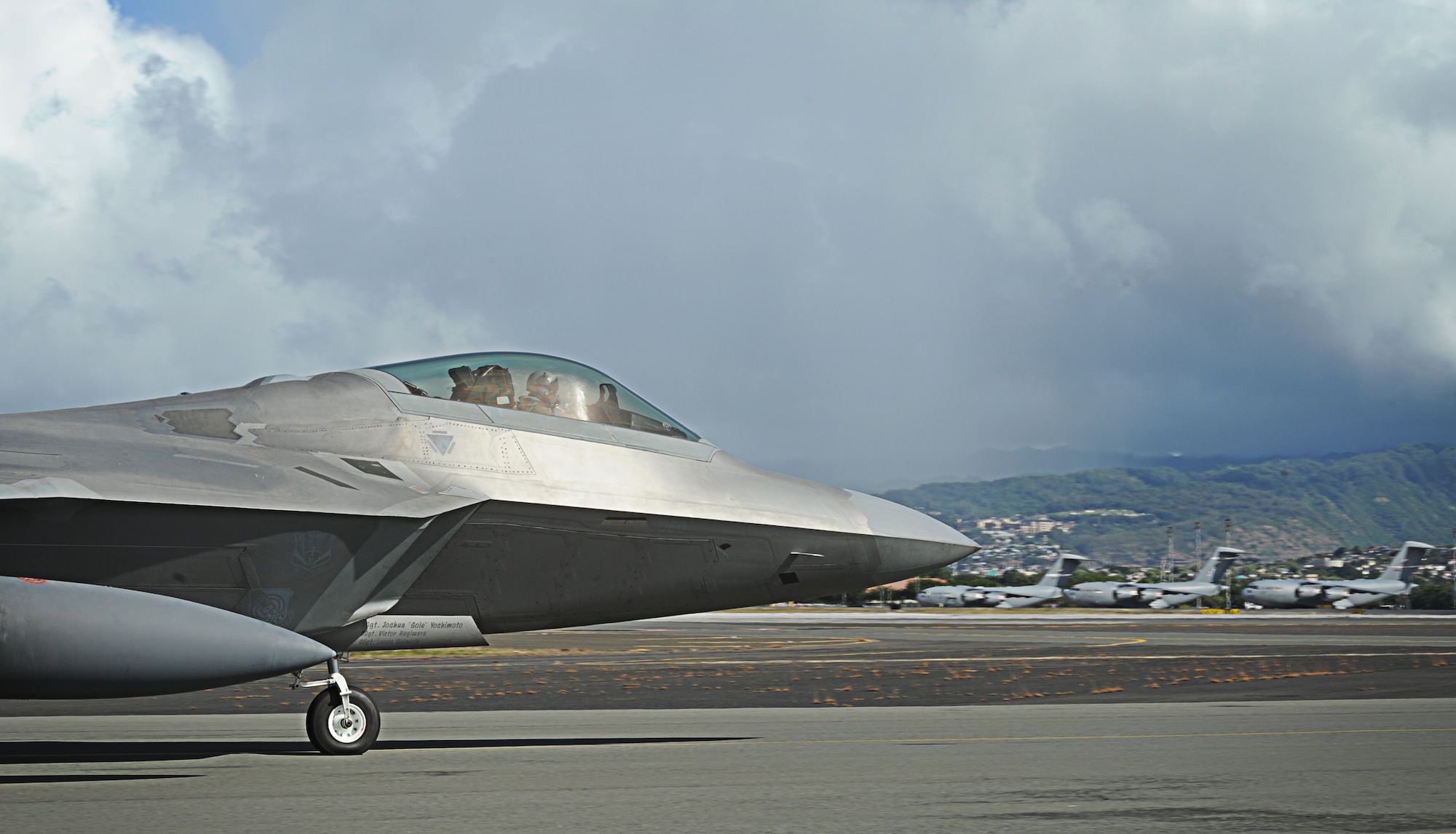 An F-22 Raptor pilot taxis for takeoff from Joint Base Pearl Harbor-Hickam, Hawaii, during an Initial Operational Capability (IOC) certification Nov. 8. The F-22, a critical component of the Global Strike Task Force, is designed to project air dominance, rapidly and at great distances and defeat threats attempting to deny access to our nation's Air Force, Army, Navy and Marine Corps. The F-22 cannot be matched by any known or projected fighter aircraft. (U.S. Air Force photo/Senior Airman Lauren Main)