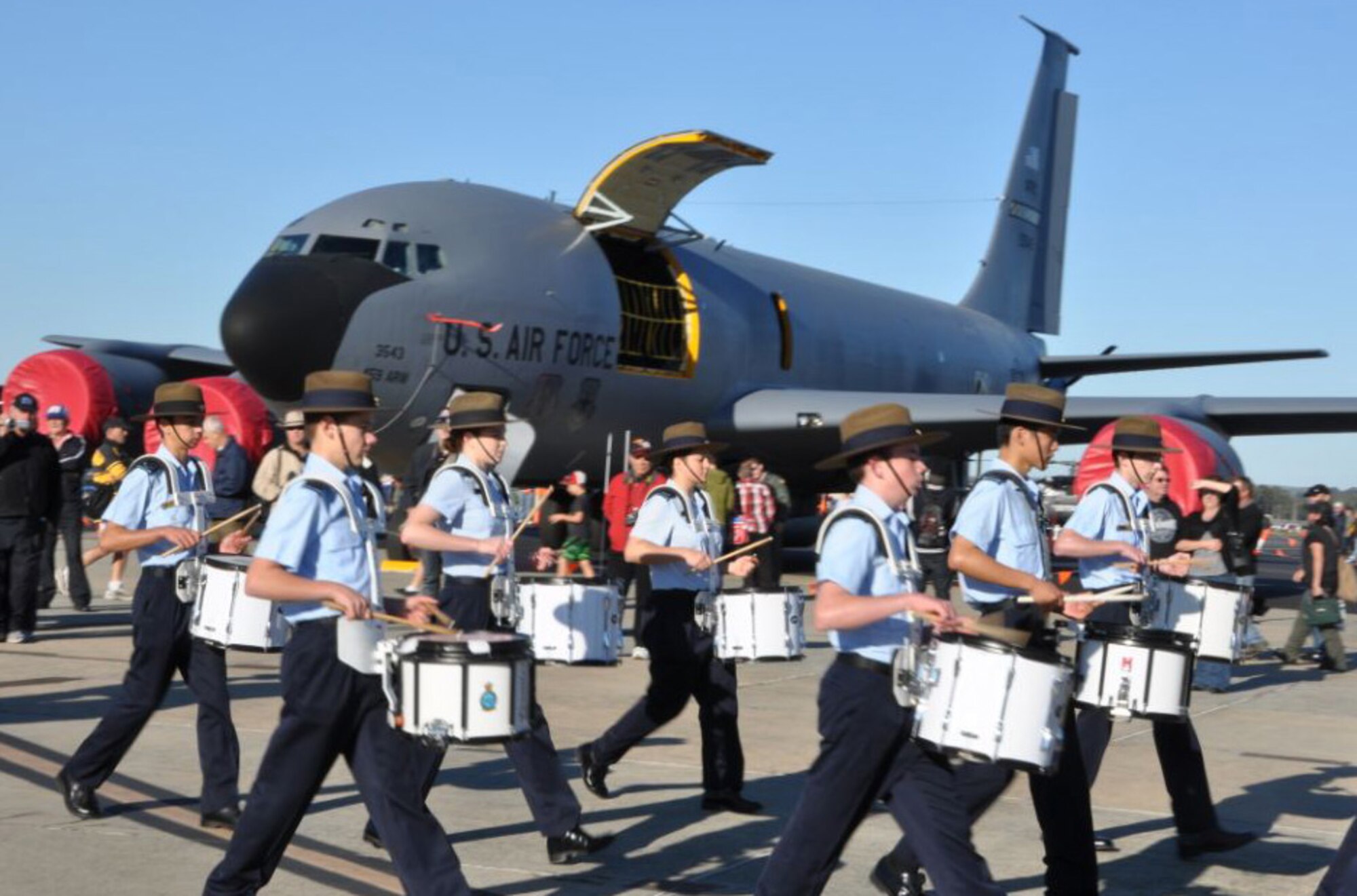 Cadets from the Royal Australian Air Force march in formation past a KC-135 Stratotanker from the 459th Air Refueling Wing, Joint Base Andrews, Md., in Pearce, Australia, May 18, 2012. The 459 ARW are assisting fellow airmen of the RAAF by having one of their aircraft on display for the Defence Force Air Show, May 19 to 20, 2012. (U.S. Air Force photo/ Senior Airman Katie Spencer) Eds. Note [Eds. The spelling Defence is in original document]