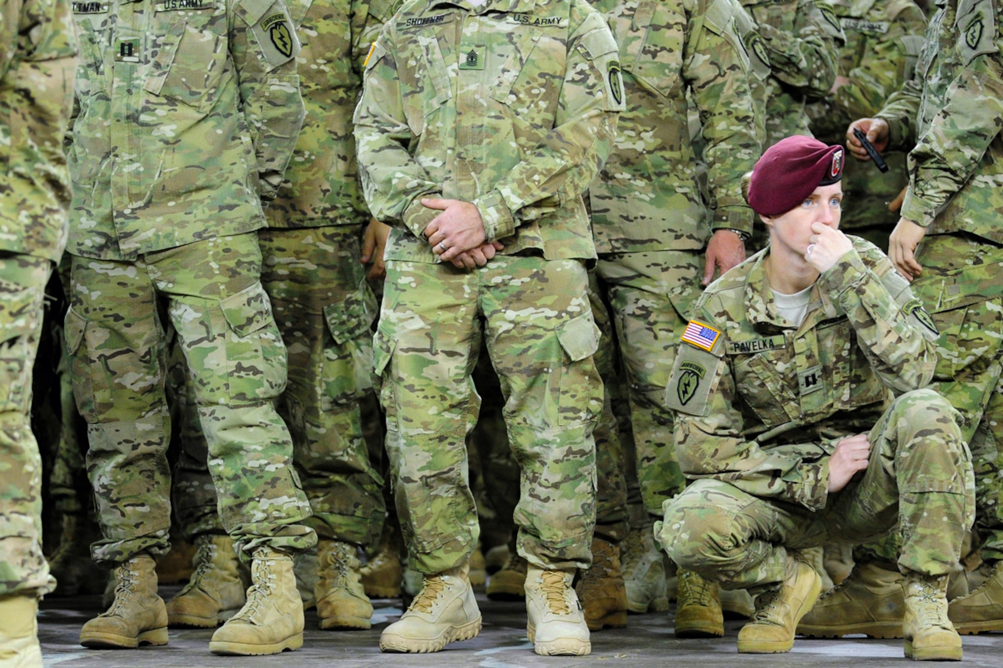 JOINT BASE ELMENDORF-RICHARDSON, Alaska -- U.S. Army Capt. Callea Pavelka, a native of Omaha, Neb., assigned to Delta Troop 1st Squadron (Airborne) 40th Cavalry Regiment, collects her thoughts as fellow paratroopers of U.S. Army Alaska's 4th Brigade Combat Team (Airborne), 25th Infantry Division, their families and distinguished guests gathered at the Sullivan Arena in Anchorage, Thursday, Nov. 1, 2012, for a redeployment ceremony to formally welcome the brigade home from a 10-month deployment to Afghanistan's Paktya and Khowst provinces in support of Operation Enduring Freedom XII-XIII.  During the deployment eight of Task Force Spartan's Soldiers were killed-in-action.  (U.S. Air Force photo by Justin Connaher)
