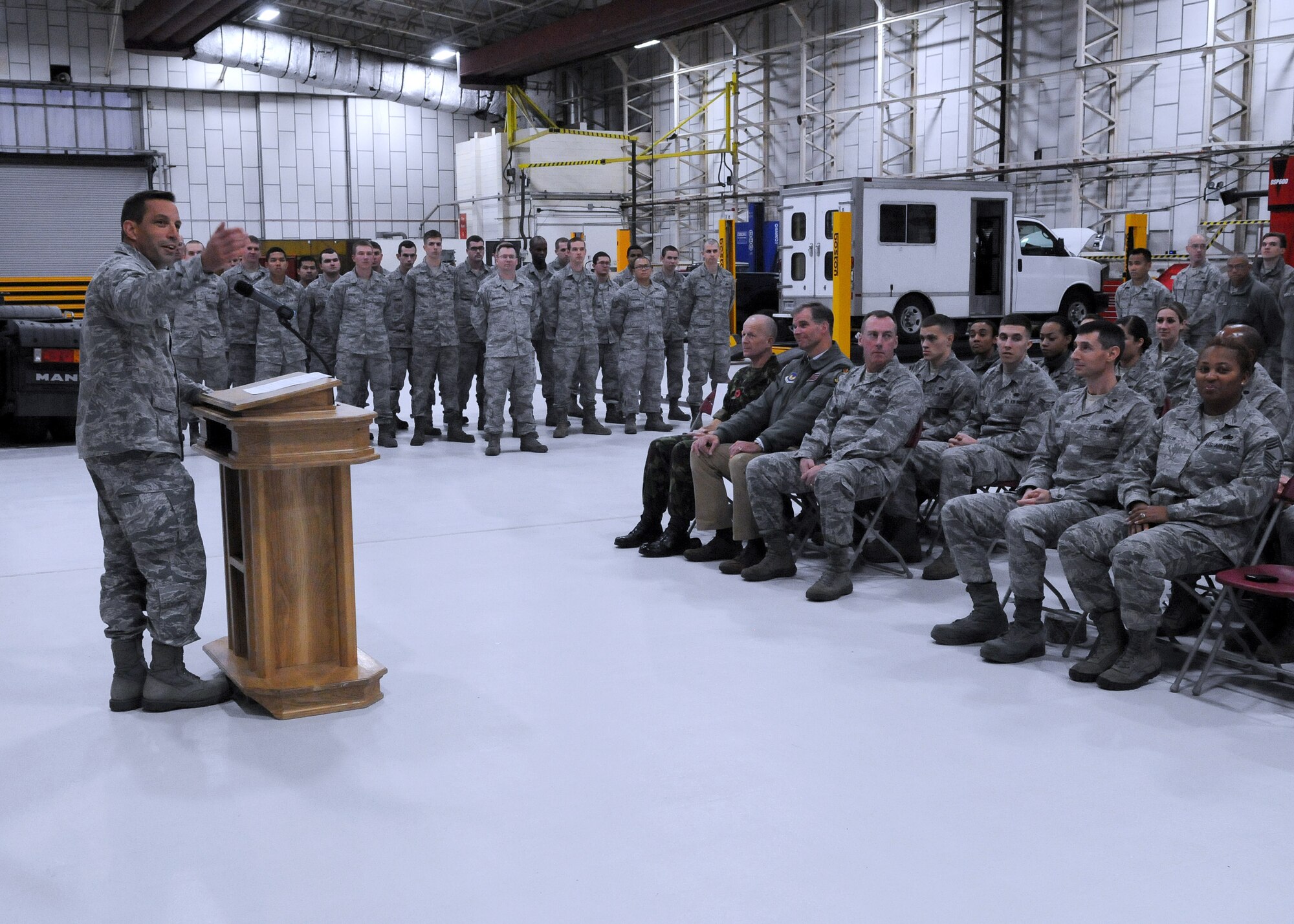 Col. Christopher Kulas, 100th Air Refueling Wing commander, speaks during a ribbon-cutting ceremony for the reopening of Building 610 Nov. 8, 2012, at RAF Mildenhall, England.  Building 610, the 100th Logistics Readiness Squadron customer service and vehicle management facility, was recently renovated. (U.S. Air Force photo by Staff Sgt. Tabitha M. Lee/Released)