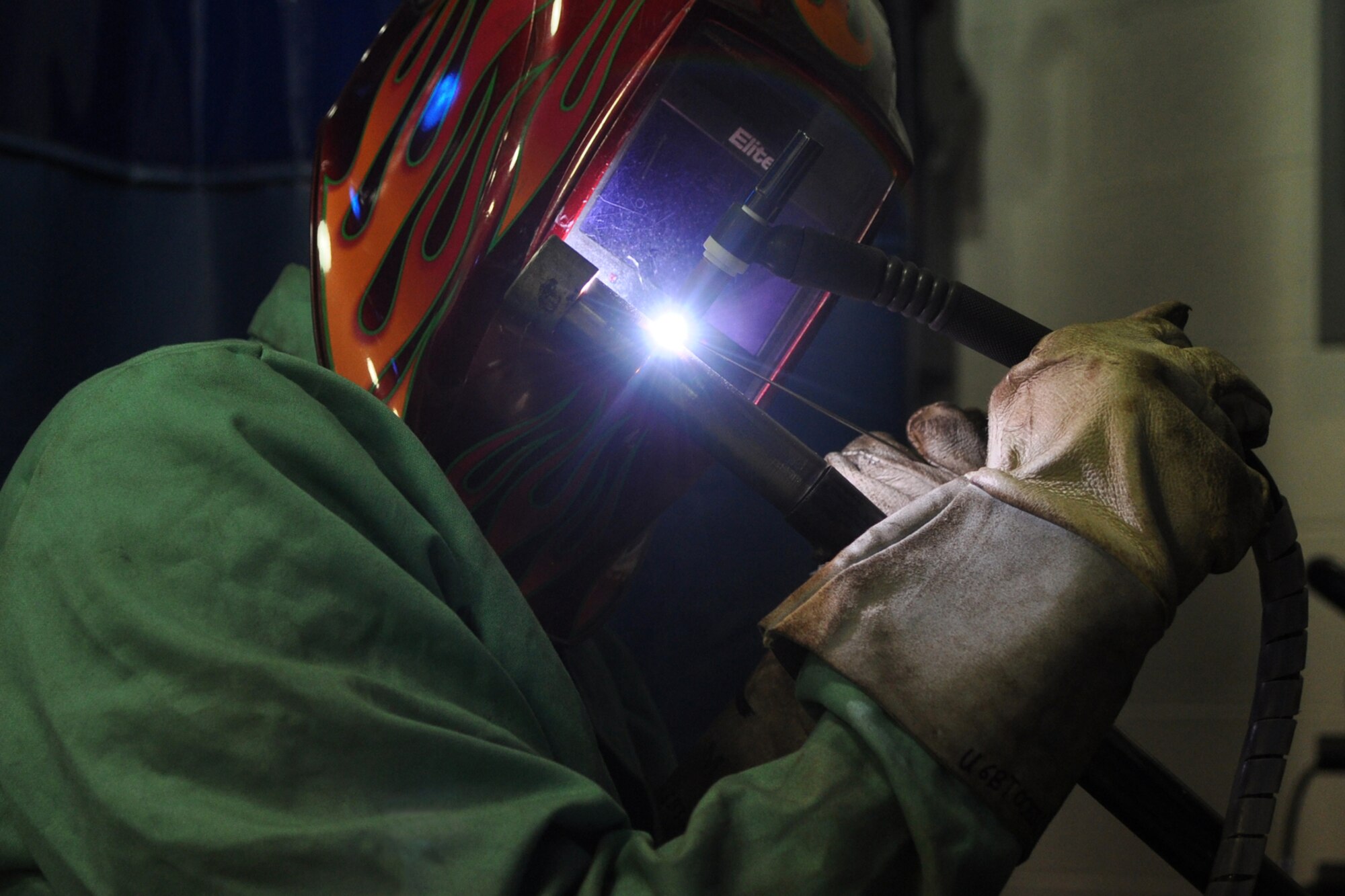 Senior Airman Travis Reuther, who is a metals technologist assigned to the 307th Maintenance Squadron, welds a titanium tube as part of his training progress at Barksdale Air Force Base, La., Nov. 4, 2012. (U.S. Air Force photo by Master Sgt. Jeff Walston/ Released)   