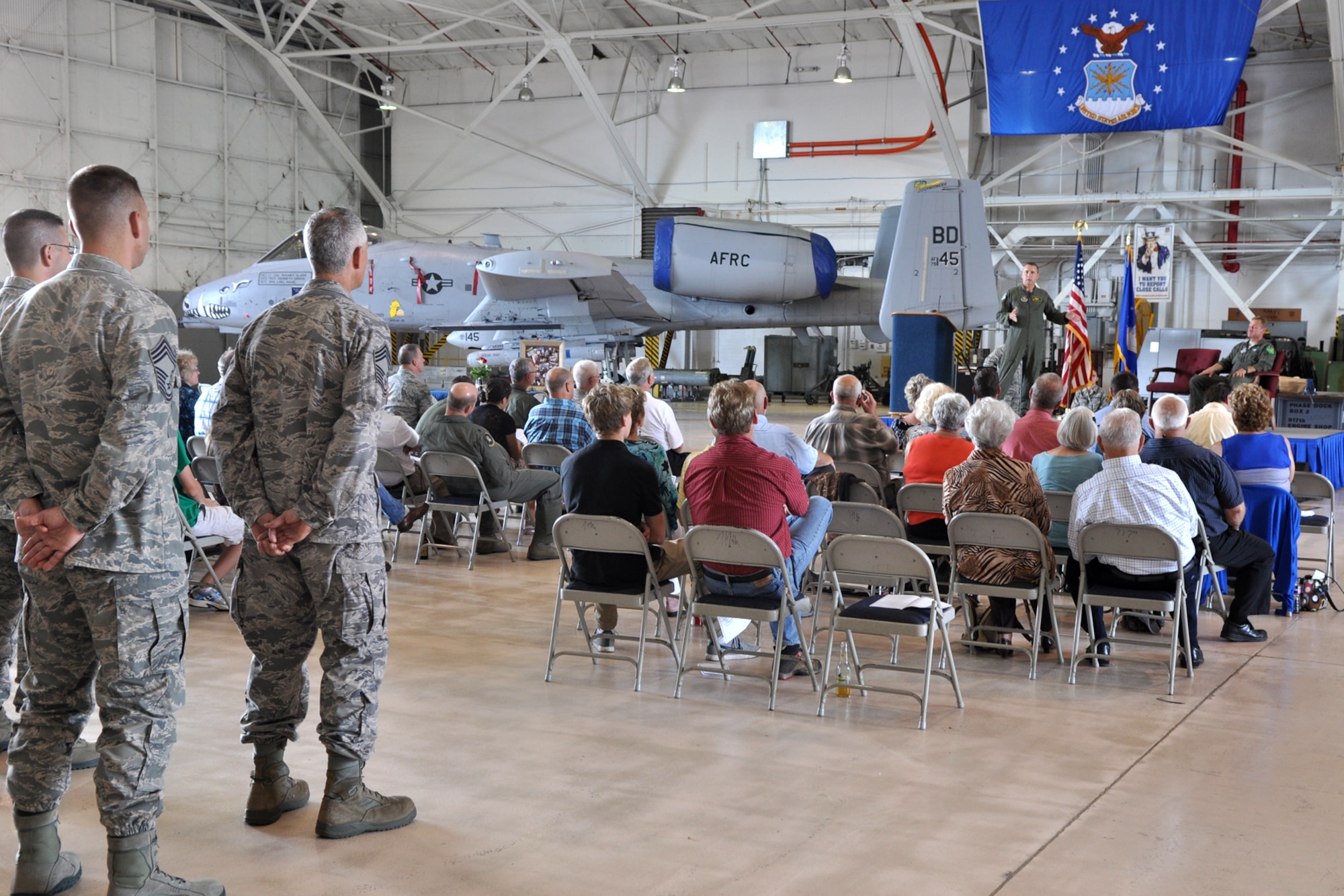 U.S. Air Force Col. John Breazeale, commander, 917th Fighter Group, speaks to family and friends of Lt. Col. Rodney Glass, the 917th FG deputy commander, during a retirement ceremony at Barksdale Air Force Base, La., Nov. 3, 2012. Glass, who has more than 4,000 flying hours, was retiring after 28 years of service to his country. (U.S. Air Force photo by Master Sgt. Jeff Walston/Released)