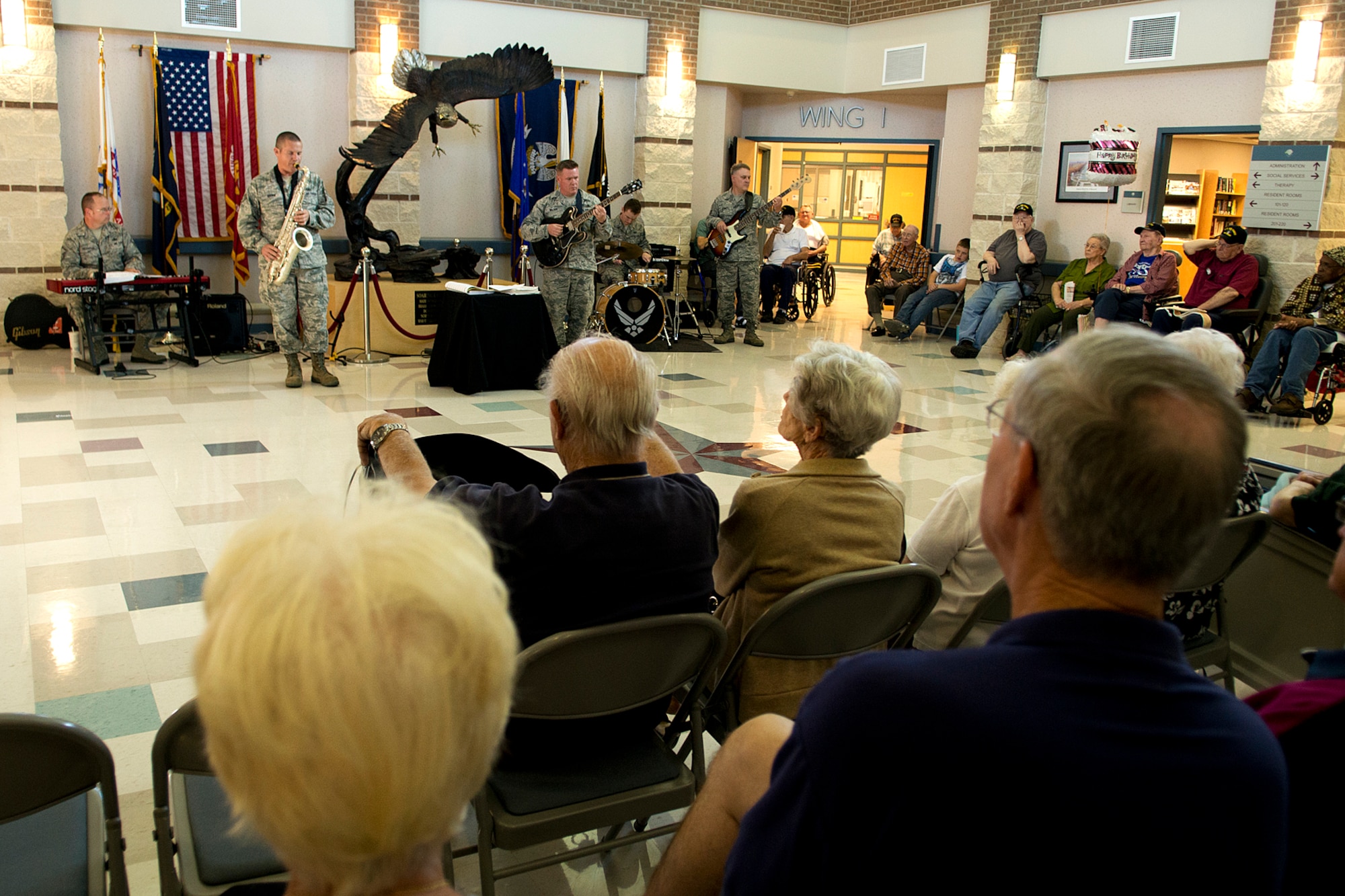 Members of the U.S. Air Force Band of the West perform for a group of veterans at the Northwest Louisiana Veterans Home, Nov. 6, 2012, Bossier City, La. Performing are Master Sgt. Neill Herndon, piano, Staff Sgt. Cody Brown, saxophone, Master Sgt. Steve Wilson, guitar, Airman 1st Class Mark Wheeler, drums, and Master Sgt. Doug Bennent. (U.S. Air Force photo by Master Sgt. Greg Steele/Released)