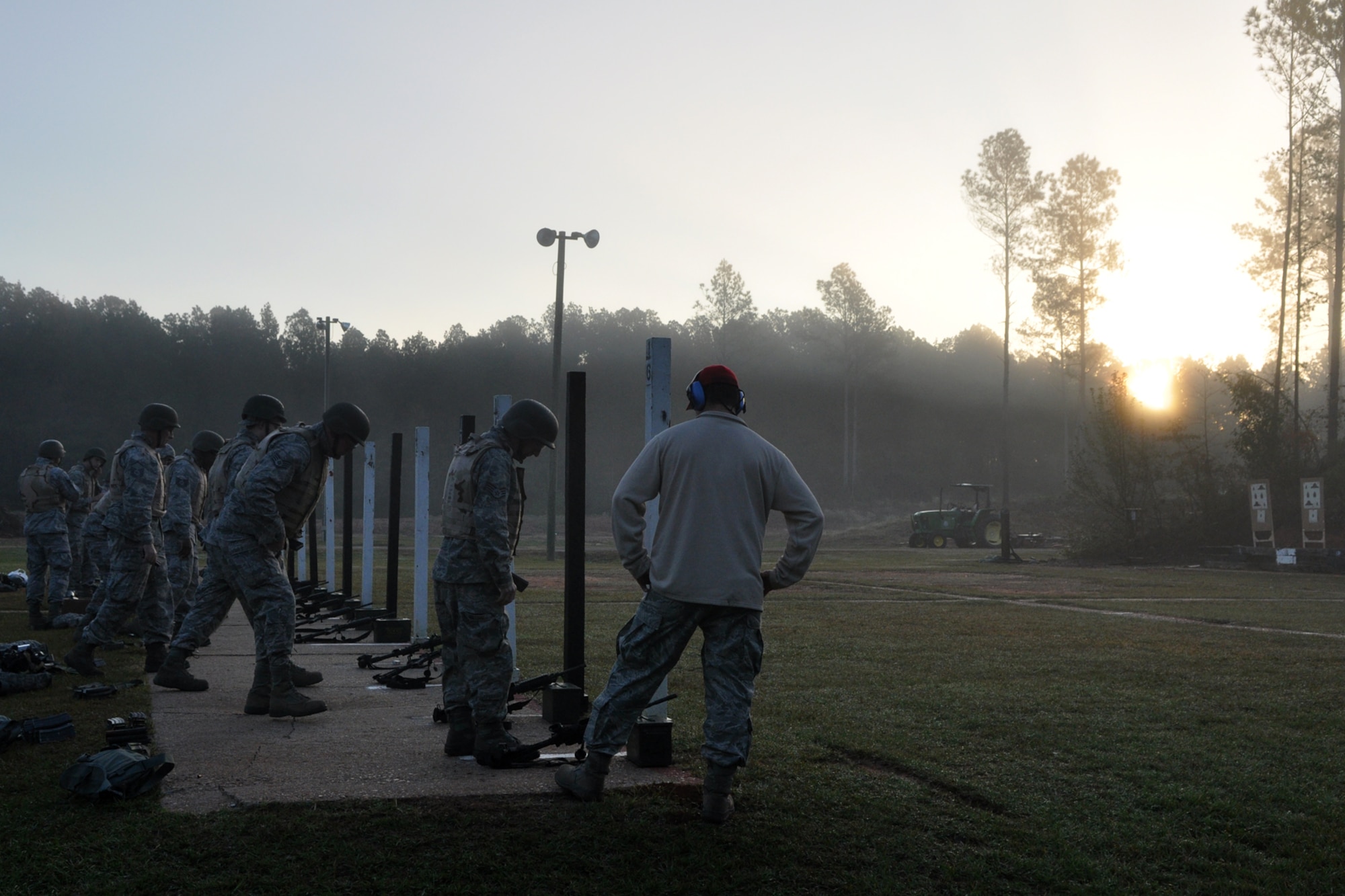 Airmen from the 307th Civil Engineer Squadron beat the Sun to the firing line at a range near Barksdale Air Force Base, La., Nov. 3, 2012. (U.S. Air Force photo by Master Sgt. Jeff Walston/Released) 