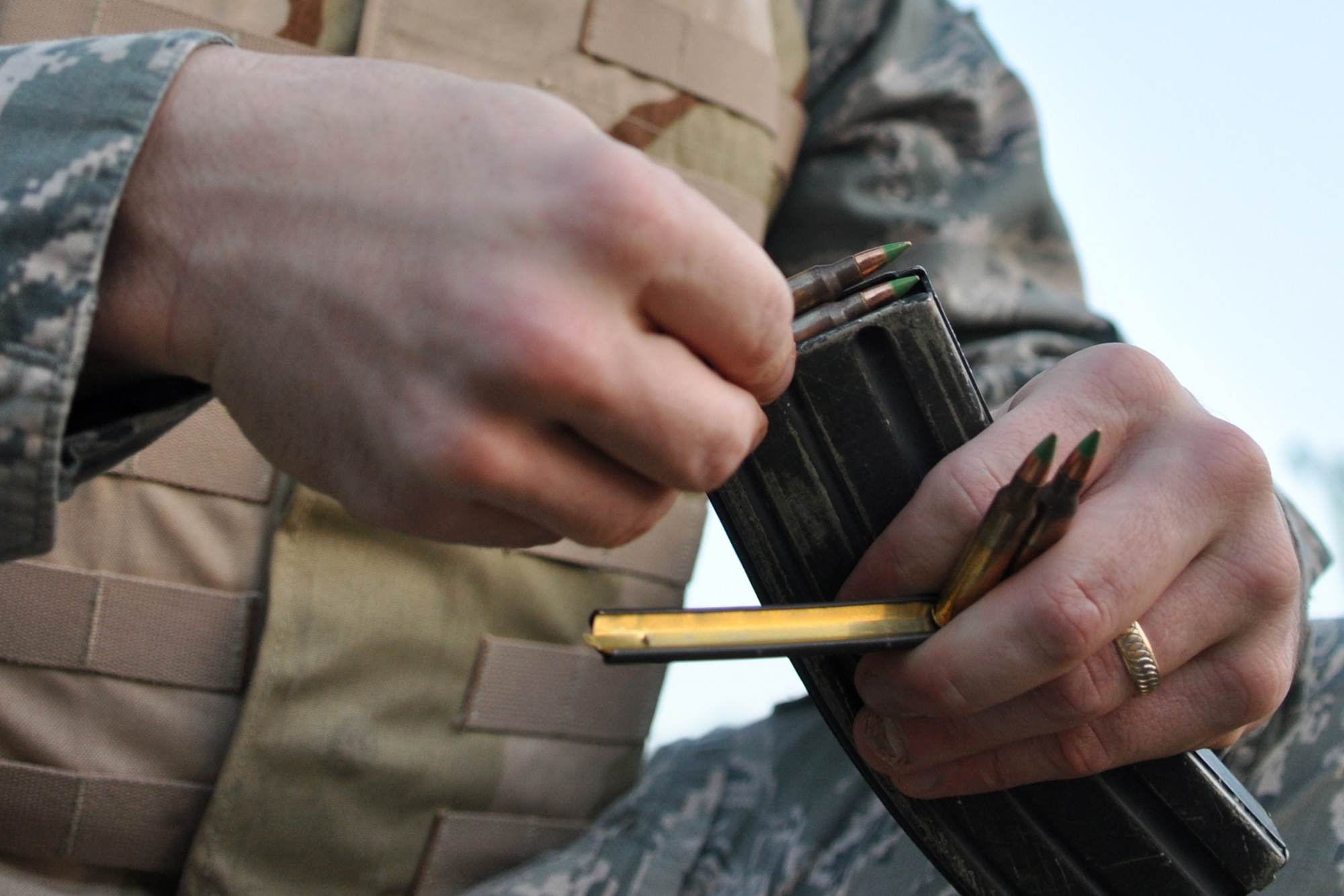 Master Sgt. Jason Colvin, an engineer assistant assigned to the 307th Civil Engineer Squadron, loads a magazine at a firing range near Barksdale Air Force Base, La., Nov. 3, 2012. (U.S. Air Force photo by Master Sgt. Jeff Walston/Released) 