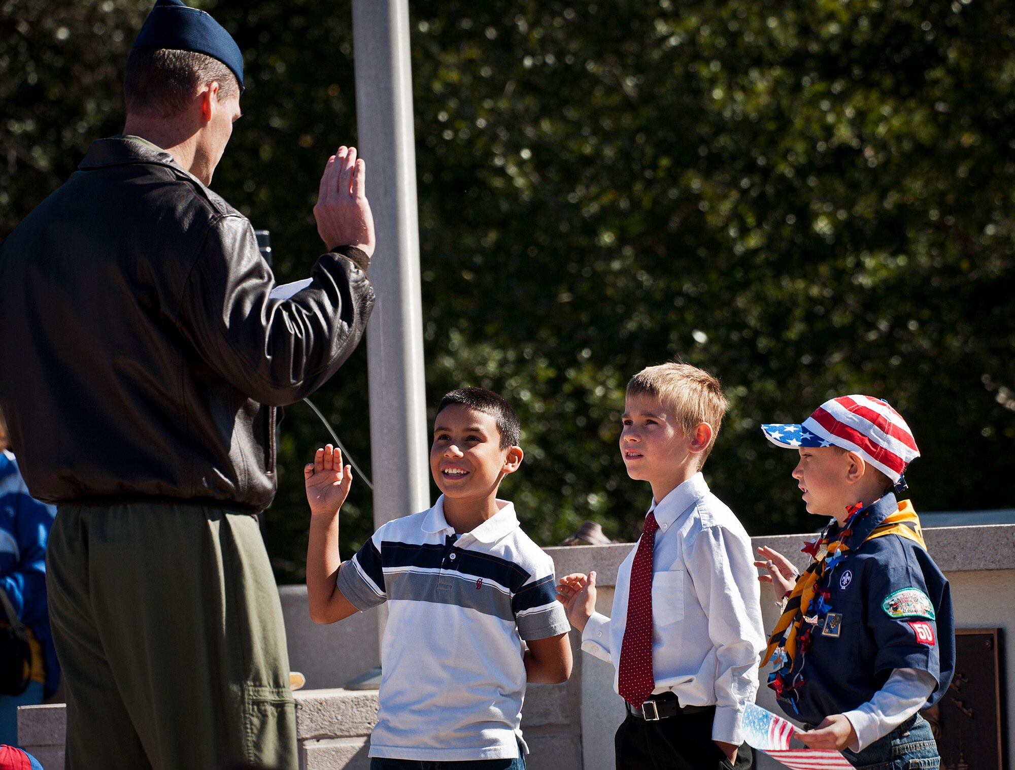 Lt. Col. Lee Kloos, the 58th Fighter Squadron commander, swears in some new Airmen from Eglin Elementary School during the school’s Veterans Day ceremony at the All Wars Memorial at Eglin Air Force Base, Fla., Nov. 8.   Kloos was the guest speaker at the event.  More than 400 students attended the ceremony.  (U.S. Air Force photo/Samuel King Jr.)
