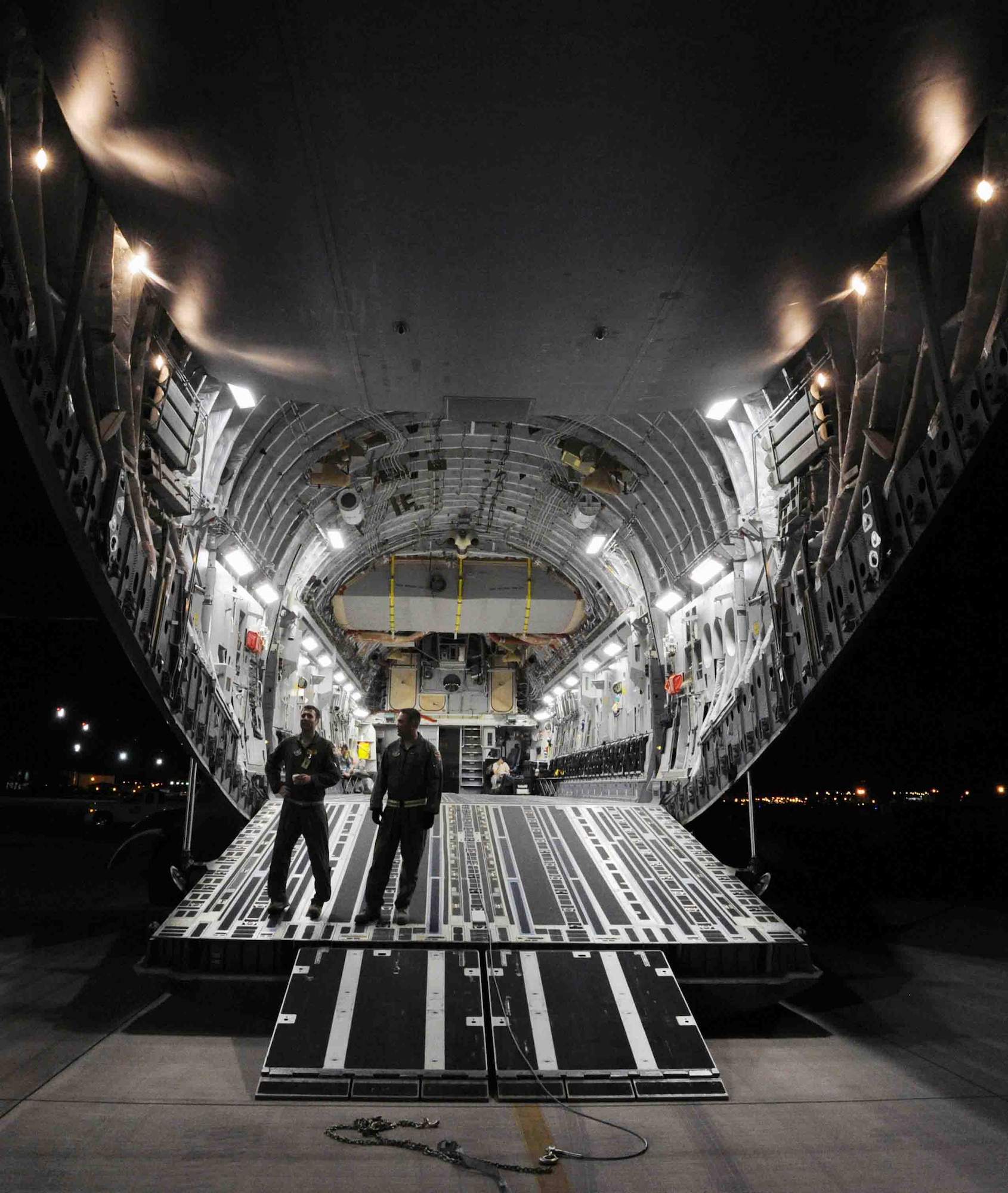 The interior of a C-17 Globemaster III can be seen shortly before Airmen from the 154th and 15th Wings performed a "live load" on the aircraft Nov. 9 during an exercise at Joint Base Pearl Harbor-Hickam, Hawaii. As part of a Phase I deployment exercise, the live load  simulated one step in a deployment process designed to rapidly deploy Airmen in response to worldwide contingency operations. (U.S. Air Force photo by Staff Sgt. Nathan Allen)