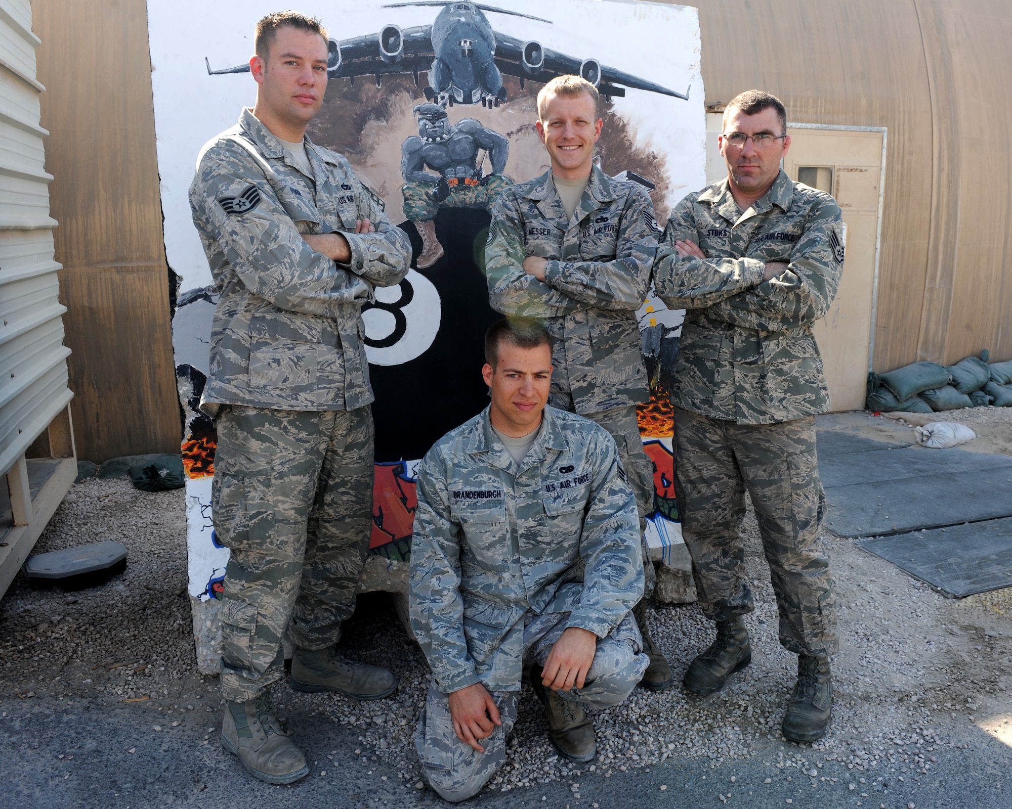 Tech. Sgt. Christopher Messer, Staff Sgt. Ryan Stoks, Staff Sgt. Jesse Foor and Senior Airman Christopher Brandenburg, all assigned to the 8th Expeditionary Air Mobility Squadron, are the only aerial port expeditors in the area of responsibility. They have directed more than 200 loads in their six-month tour, having a direct impact on daily operations resulting in facilitating more missions to take place across the AOR. Due to their performance, these APEX Airmen helped the 8th EAMS achieve the 521st Air Mobility Operations Group 2012 Air Freight Flight of the Year. (U.S. Air Force photo/Senior Airman Joel Mease)