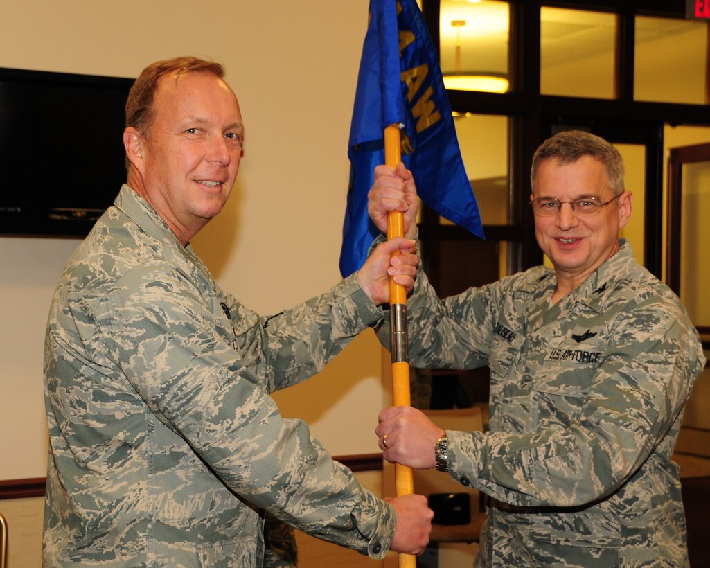 Col. Alan C. Teauseau (right) accepts the group guidon as the new 914th Mission Support Group Commander from Col. Allan Swartzmiller, 914th Airlift Wing Commander during an assumption of command ceremony on November 3, 2012 at the Niagara Falls Air Reserve Station, N.Y. The new commander brings with him a vast amount of experience as the mission support group commander from Whiteman AFB, Missouri. (U.S. Air Force photo by Peter Borys).