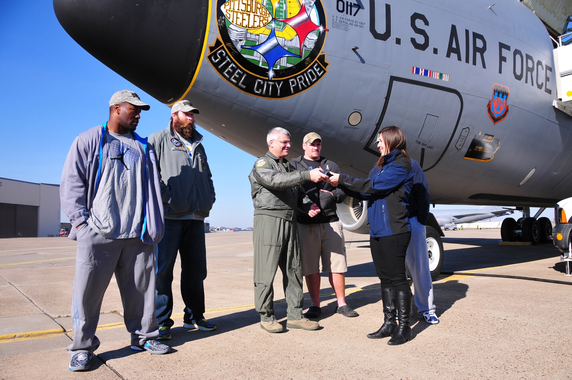 Four players from the Pittsburgh Steelers: Jonathan Dwyer, James Harrison, Brett Keisel and Doug Legursky visit the 171st Air Refueling Wing, November 6.  The visit, part of the "Salute to Service" campaign, is sponsored by the NFL in conjunction with USAA.  The NFL is also paying tribute to the Armed Forces throughout the month of November.  During the visit, the players take time to autograph one of the unit's KC-135 aircraft, Steel City Pride.
	
The Salute to Service campaign aligns with the NFL's long history of supporting America's armed services, including a partnership of more than 45 years with the USO that includes overseas visits to troops and trips to military hospitals nationwide. 

During the Pittsburgh Steelers' November 12 game, the Steelers will honor a veteran from every war, and recognize a local Harrier pilot who was shot down and killed last month over Afghanistan. The Steelers will also recognize their local military community by paying tribute to the service men and women of the 171st Air Refueling Wing. The team is partnering with USAA for a stadium-wide card stunt that features a special military appreciation message during the National Anthem. Fans will be instructed to hold up the card at their seats just before the National Anthem. 

(National Guard photo by Master Sgt. Ann Young/released)
