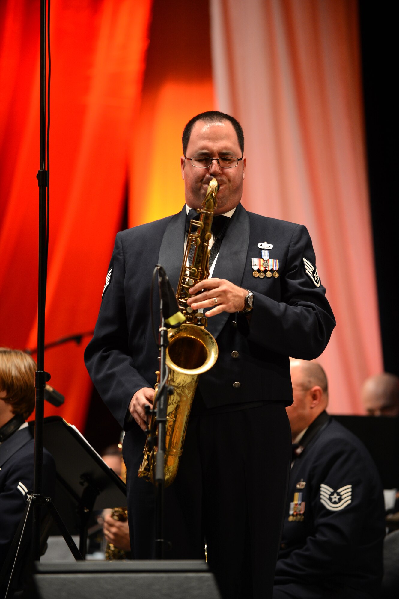 RADOM, Poland -- U.S. Air Force Staff Sgt. David Fatek, U.S. Air Forces in Europe Concert Band saxophone player from Philadelphia, performs a solo at the Radom City Hall concert hall Nov. 5, 2012.  Fatek has been touring with the USAFE Concert Band for almost three years. (U.S. Air Force photo by Airman 1st Class Gustavo Castillo/Released)