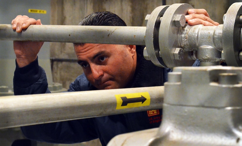 Philip Golia, a member of the maintenance team at the U.S. Army Corps of Engineers’ Black Butte Lake, controls water releases from Black Butte Dam outside Orland, Calif., Nov. 2, 2012. Golia came to the Corps through the U.S. Army’s Warrior Care and Transition Program - quite a change from his U.S. Army service in Afghanistan, where he cleared roadside bombs from major supply routes. 