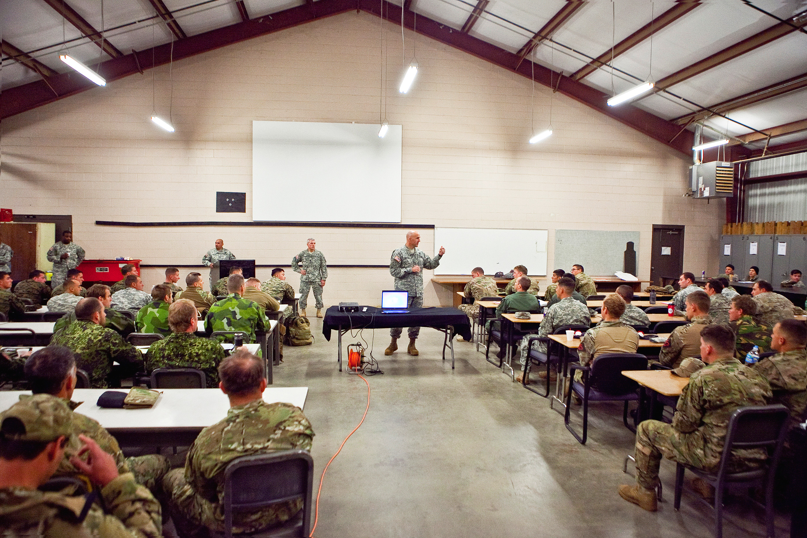 Army Col. Michael W. Rauhut, center, competitors for the 2012