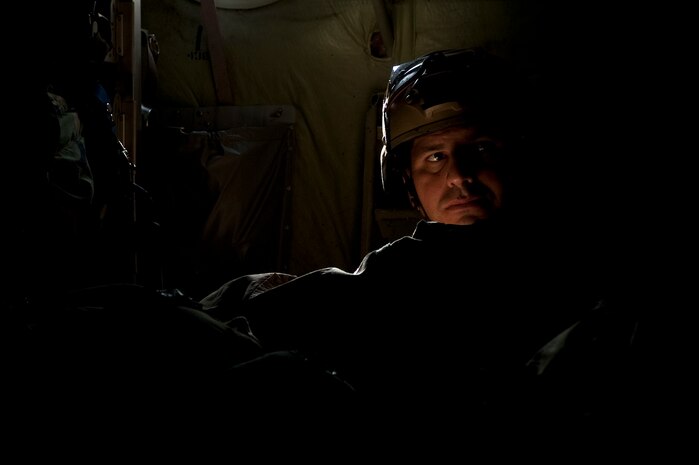 Tech. Sgt. Jose Gonzales, 820th RED HORSE airborne flight member, prepares to perform a static-line jump on a C-130 Hercules as it approaches a designated drop zone during Aviation Nation 2012 Nov. 20, 2012, at Nellis Air Force Base, Nev. Five members of the 820th RED HORSE airborne flight participated in the jump as a part of Aviation Nation. (U.S. Air Force photo by Staff Sgt. Christopher Hubenthal) 