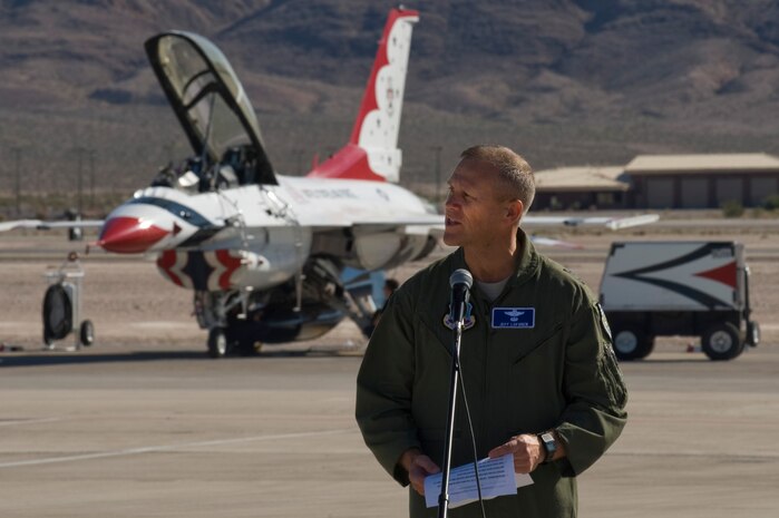 U.S. Air Force Maj. Gen. Jeffrey Lofgren, U.S. Air Force Warfare Center commander, makes opening remarks during Aviation Nation Nov.10, 2012, at Nellis Air Force Base, Nev. The USAFWC oversees the operations of the Air Force Demonstration Squadron, the Thunderbirds. (U.S. Air Force photo by Staff Sgt. William P. Coleman) 
  

