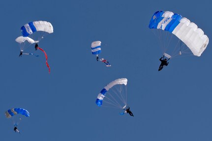 The U.S. Air Force Academy's Wings of Blue Parachute Team steer their parachutes for precision landings during Aviation Nation Nov.10, 2012, at Nellis Air Force Base, Nev.  The Wings of Blue team is based at the U.S. Air Force Academy in Colorado Springs, Colo. 
(U.S. Air Force photo by Staff Sgt. William P. Coleman) 
  

