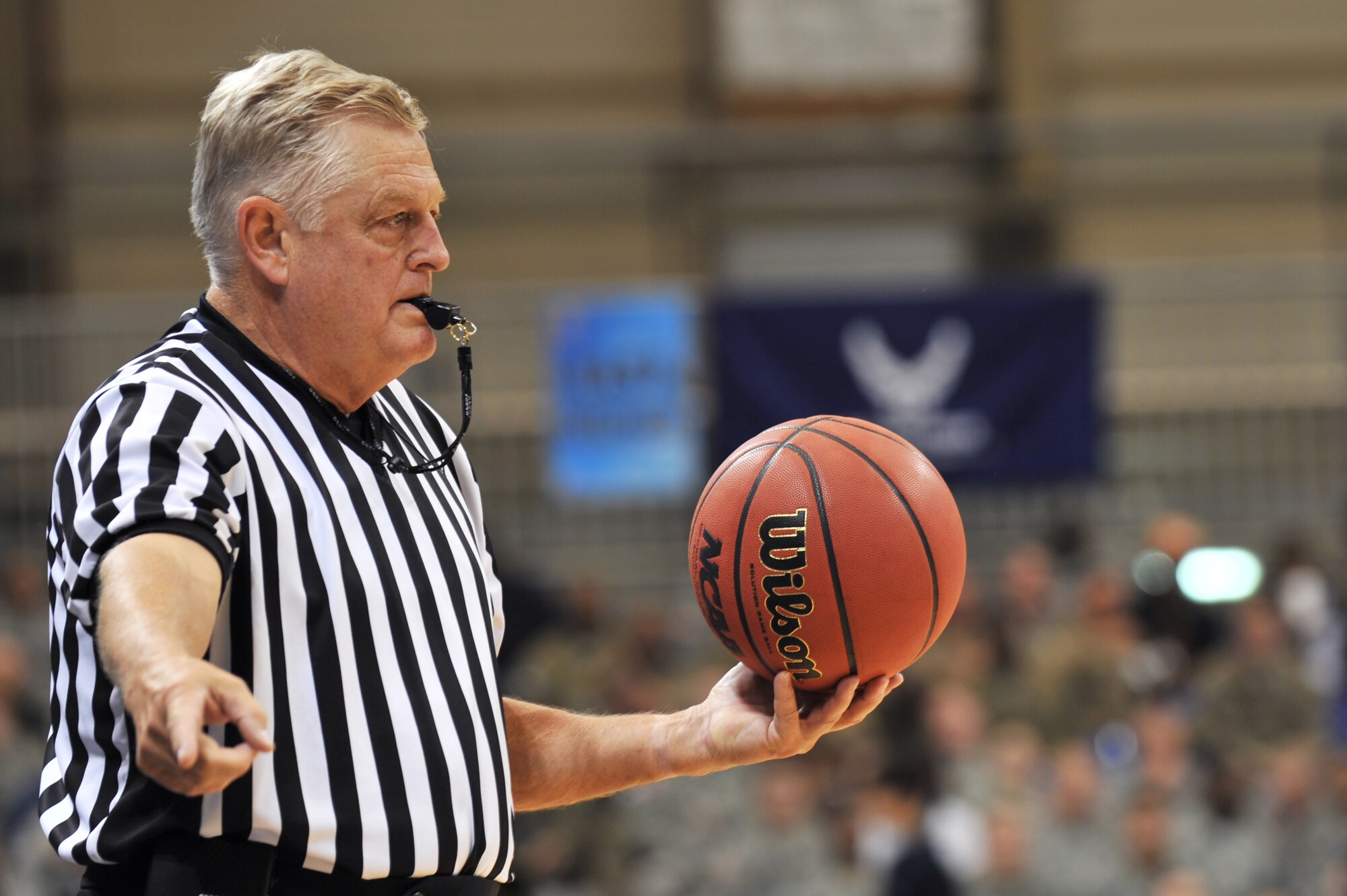Official Jim Burr makes a call during the 2012 Armed Forces Classic on Ramstein Air Base, Germany, Nov. 10, 2012. The match-up between Michigan State and the University of Connecticut is part of ESPN's Veteran's week initiative to honor the men and women who have served and are still serving in the U.S. military. (U.S. Air Force photo/Senior Airman Caitlin O’Neil-McKeown)