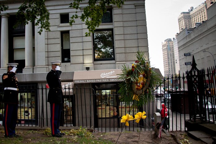 NEW YORK -- Lt. Col. Richard Bordonaro, 6th Communication Battalion, commanding officer, and Sgt. Maj. George Sanchez, salute the graveof Lt. Col. Franklin Wharton's grave. The Marines placed a wreath to pay tribute to Wharton on the 237th Birthday of the Marine Corps, Nov. 10, 2012.  Wharton was the 3rd Commandant of the Marine Corps. He served from 1798 to 1818 and was the first Commandant to occupy the Commandant's House, Marine Barracks, Washington. He was born in Philadelphia, and now rests at Trinity Church a few blocks away from Wall Street in Manhattan. (Marine Corps production by Sgt. Randall A. Clinton / RELEASED)