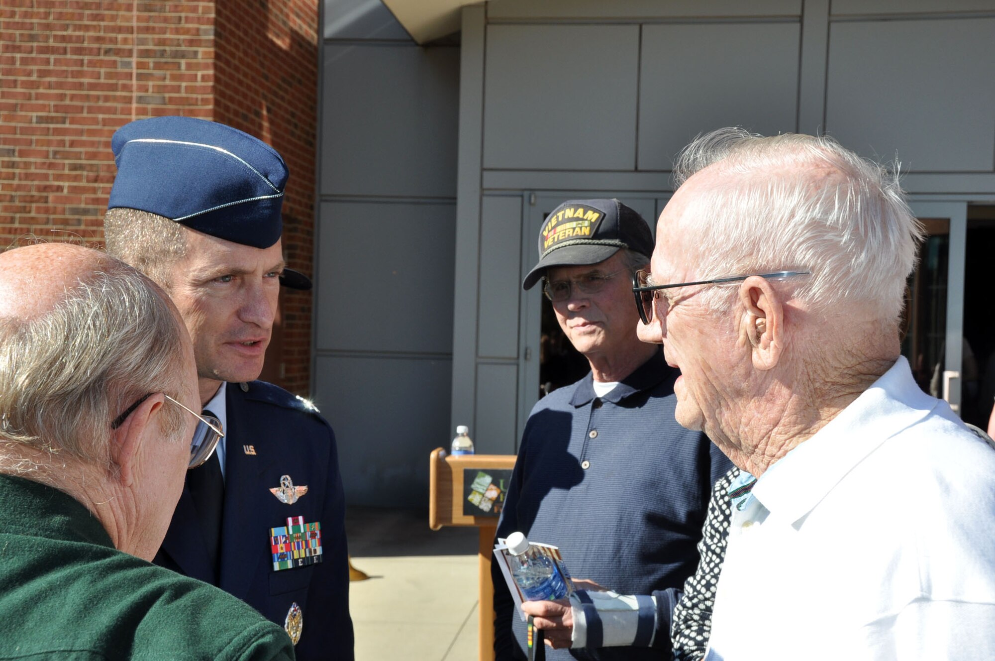 Col. James J. Fontanella, 315th Airlift Wing commander at Joint Base Charleston-Air Base, S.C. speaks with retired Brigadier General Tedd L. Bishop former commander of the 437 AW at JB Charleston March 1975 to March 1978.  Fontanella attended the Veterans Day ceremonies at the Upcountry History Museum Saturday Nov. 10, 2012 in Greenville, S.C. (U.S. Air Force photo/Senior Airman Bobby Pilch)