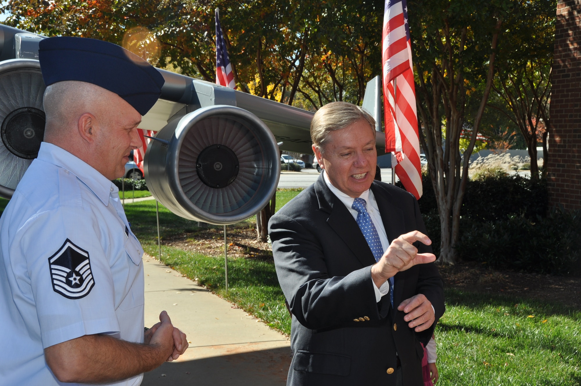 Master Sgt. Chris Fabel, one of the creators of the mini C-17 and 315th Aircraft Maintenance Squadron crew chief, discusses how the mini came to be with S.C. Sen. Lindsey Graham during the Veterans Day weekend celebration at the Upcountry History Museum Saturday Nov. 10, 2012 in Greenville, S.C. (U.S. Air Force photo/Senior Airman Bobby Pilch)