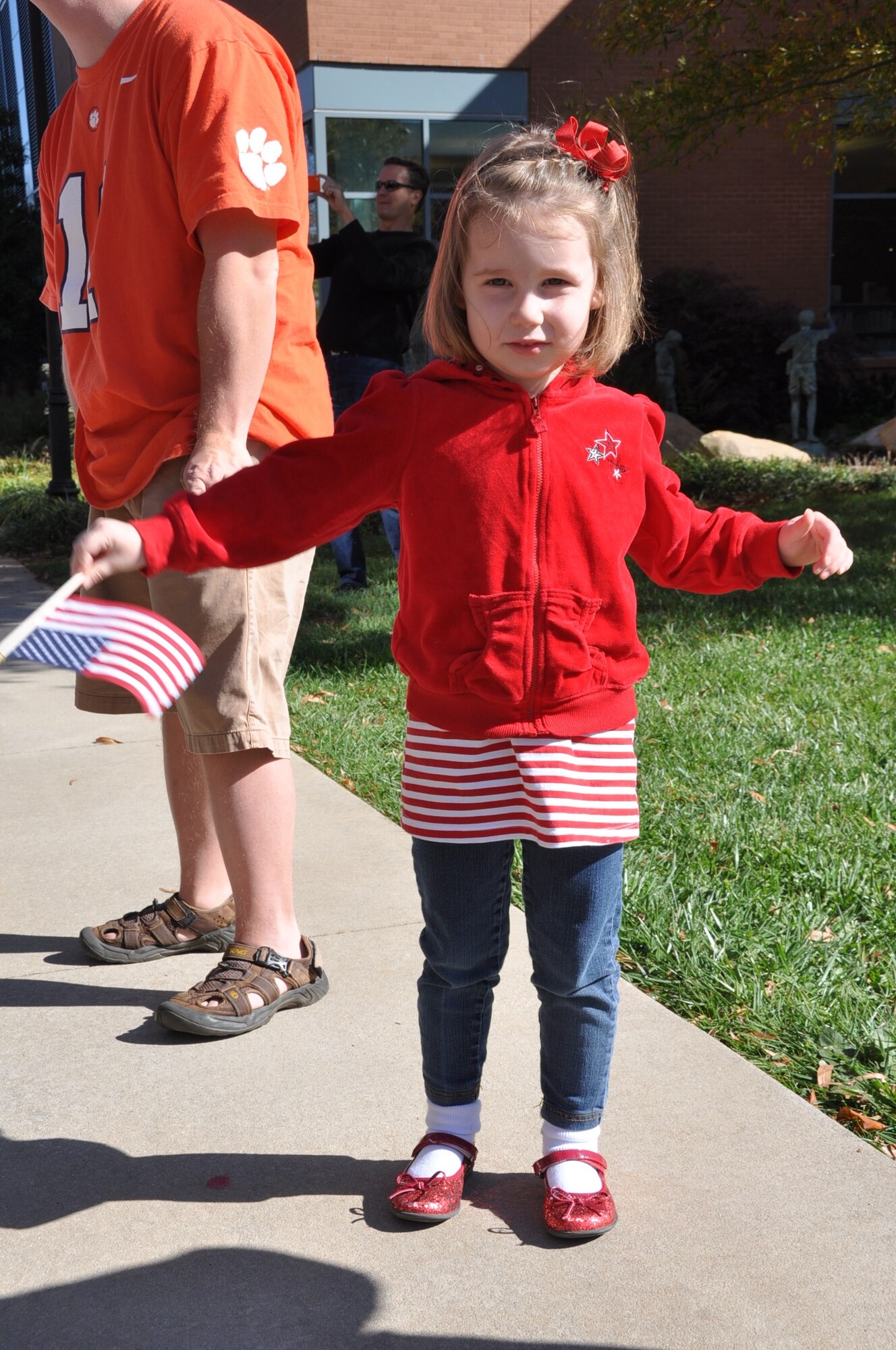Americans young and old show their patriotism during the Veterans Day weekend celebration at the Upcountry History Museum in Greenville, S.C. Saturday, Nov. 10, 2012. Airmen assigned to the 315th Airlift Wing mini C-17 team here at Joint Base Charleston-Air Base, S.C. attended the Veterans Day ceremonies at the Upcountry History Museum in Greenville, S.C. (U.S. Air Force photo/Senior Airman Bobby Pilch)