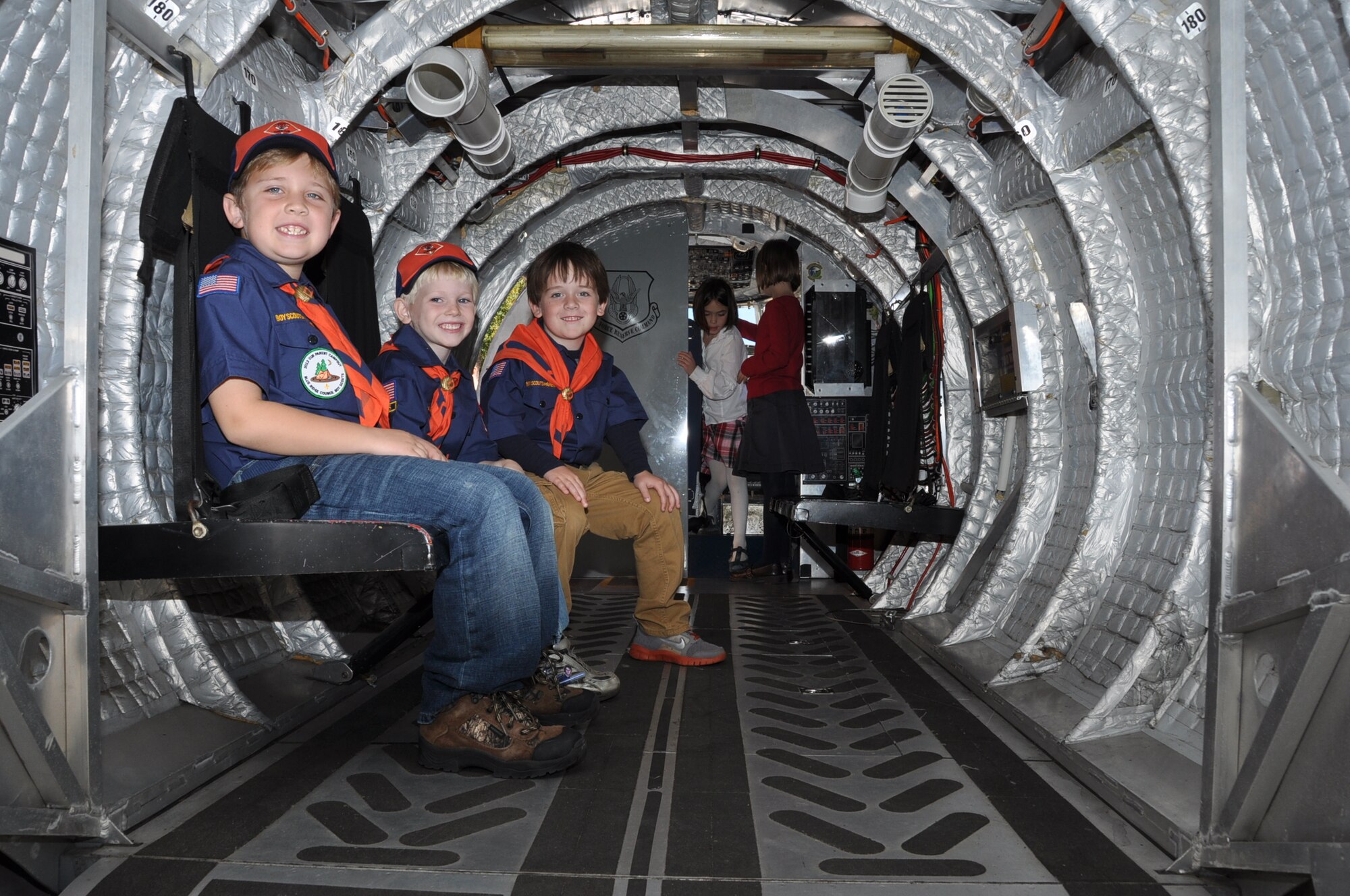 Children sit inside the cargo area in the mini C-17 Globemaster III aircraft during the Veterans Day weekend celebration at the Upcountry History Museum in Greenville, S.C. Saturday, Nov. 10, 2012. Airmen assigned to the 315th Airlift Wing mini C-17 team here at Joint Base Charleston-Air Base, S.C. attended the Veterans Day ceremonies at the Upcountry History Museum in Greenville, S.C. (U.S. Air Force photo/Senior Airman Bobby Pilch)