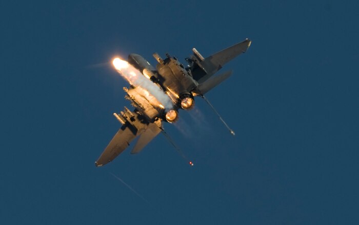 An F-15E Strike Eagle from the U.S. Air Force Weapons School deploys flares during Aviation Nation Nov.11, 2012, at Nellis Air Force Base, Nev. The "E" model is a dual-role fighter with the capability to fight its way to a target over long ranges, destroy enemy ground positions and fight its way out. 
(U.S. Air Force Photo By Senior Airman Daniel Hughes)
