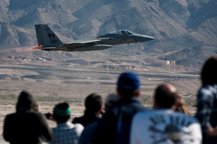 A crowd watches as an F-15D Strike Eagle flies past during the annual Aviation Nation Open House Nov. 11, 2012, at Nellis Air Force Base, Nev. The success of Aviation Nation is the result of a long-standing partnership with Nellis and the local community. (U.S. Air Force photo by Airman 1st Class Monet Villacorte)