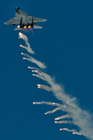An F-15E Strike Eagle from the U.S. Air Force Weapons School deploys flares during Aviation Nation Nov.11, 2012, at Nellis Air Force Base, Nev. The USAF Weapons School teaches graduate-level instructor courses that provide the world's most advanced training in weapons and tactics employment to officers of the combat air forces and mobility air forces. (U.S. Air Force Photo By Senior Airman Daniel Hughes)