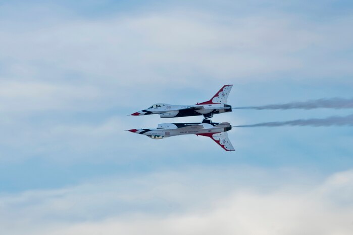 The United States Air Force Air Demonstration Squadron Thunderbirds, perform a calypso pass during the annual Aviation Nation open house Nov. 10, 2012, at Nellis Air Force Base, Nev. During the 2012 season, the team spent more than 200 days on the road representing Airmen during its 59th year. (U.S. Air Force photo by Airman 1st Class Christopher Tam)
